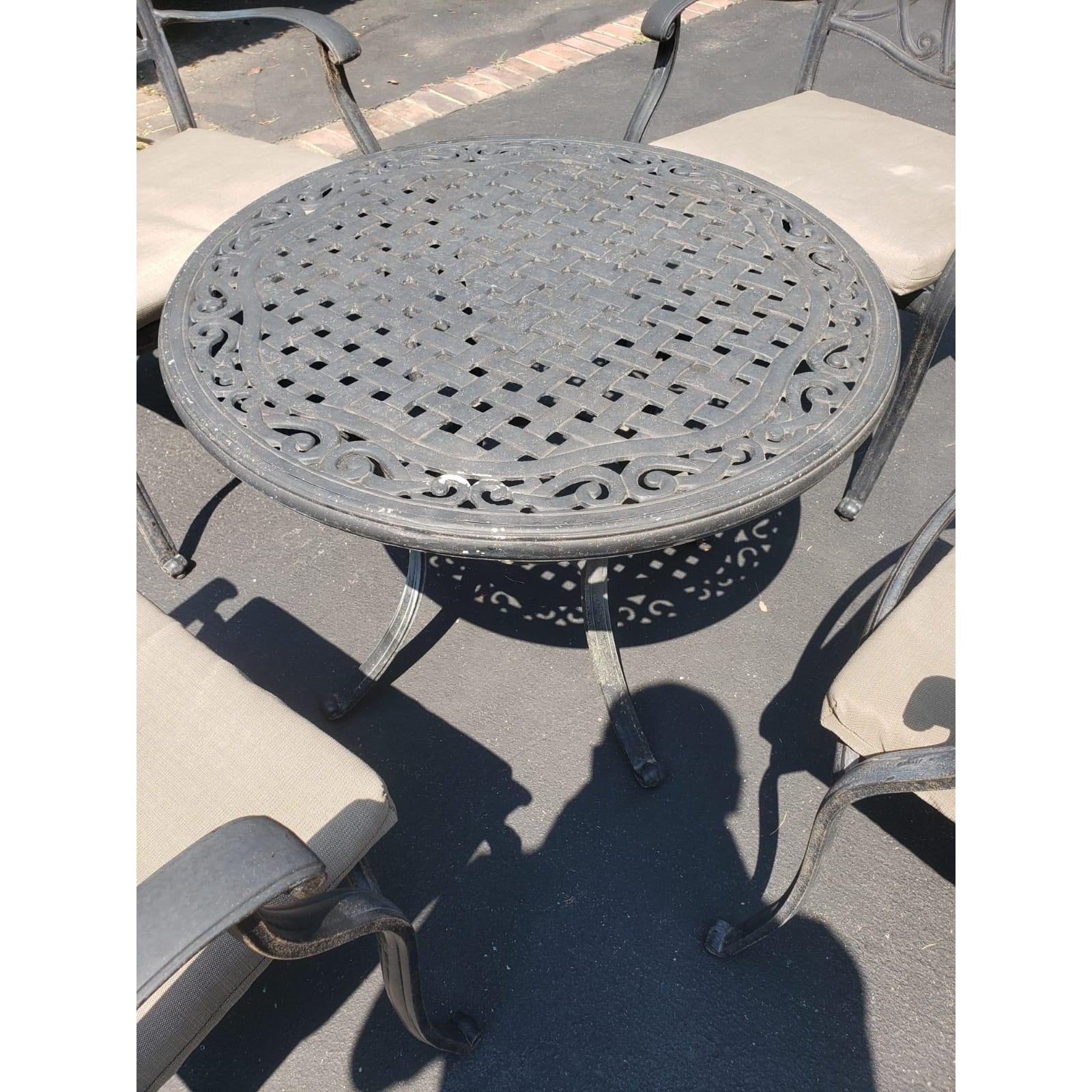 Modern Vintage Cast Aluminum Patio Table & 4 Armchairs with Cushions For Sale