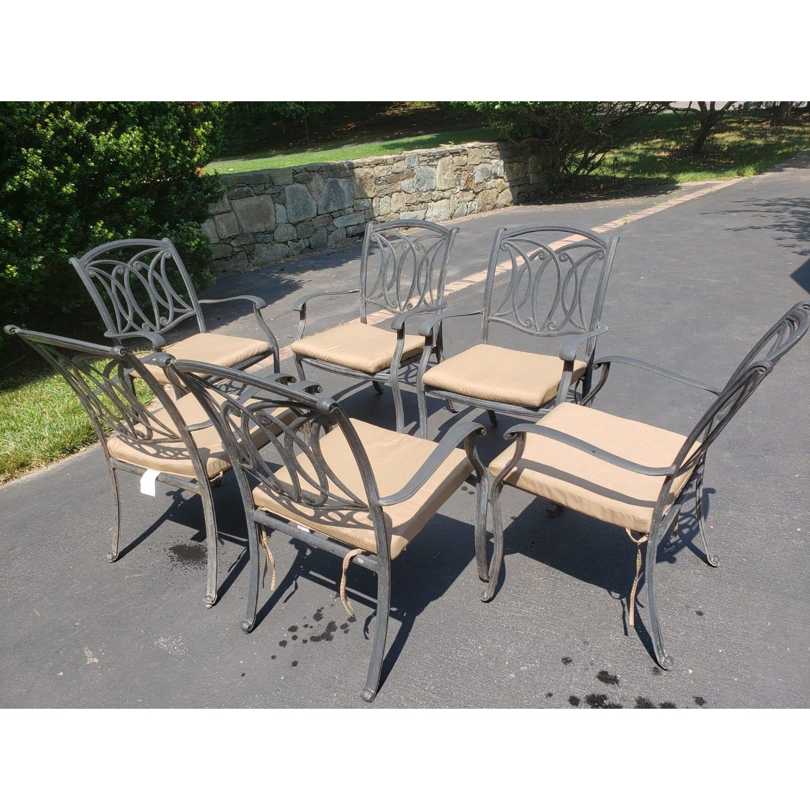 Vintage metal UV rust resistant stackable patio armchairs
set. Light weight aluminum frame very durable, Water Resistant; UV Resistant and Rust Resistant. 
Good vintage condition. Cushions optional.. Generous size 24W x 24D x 35H. Cushions are