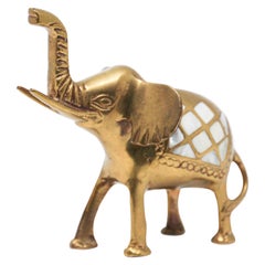 Vieille sculpture d'éléphant en laiton coulé poids papier