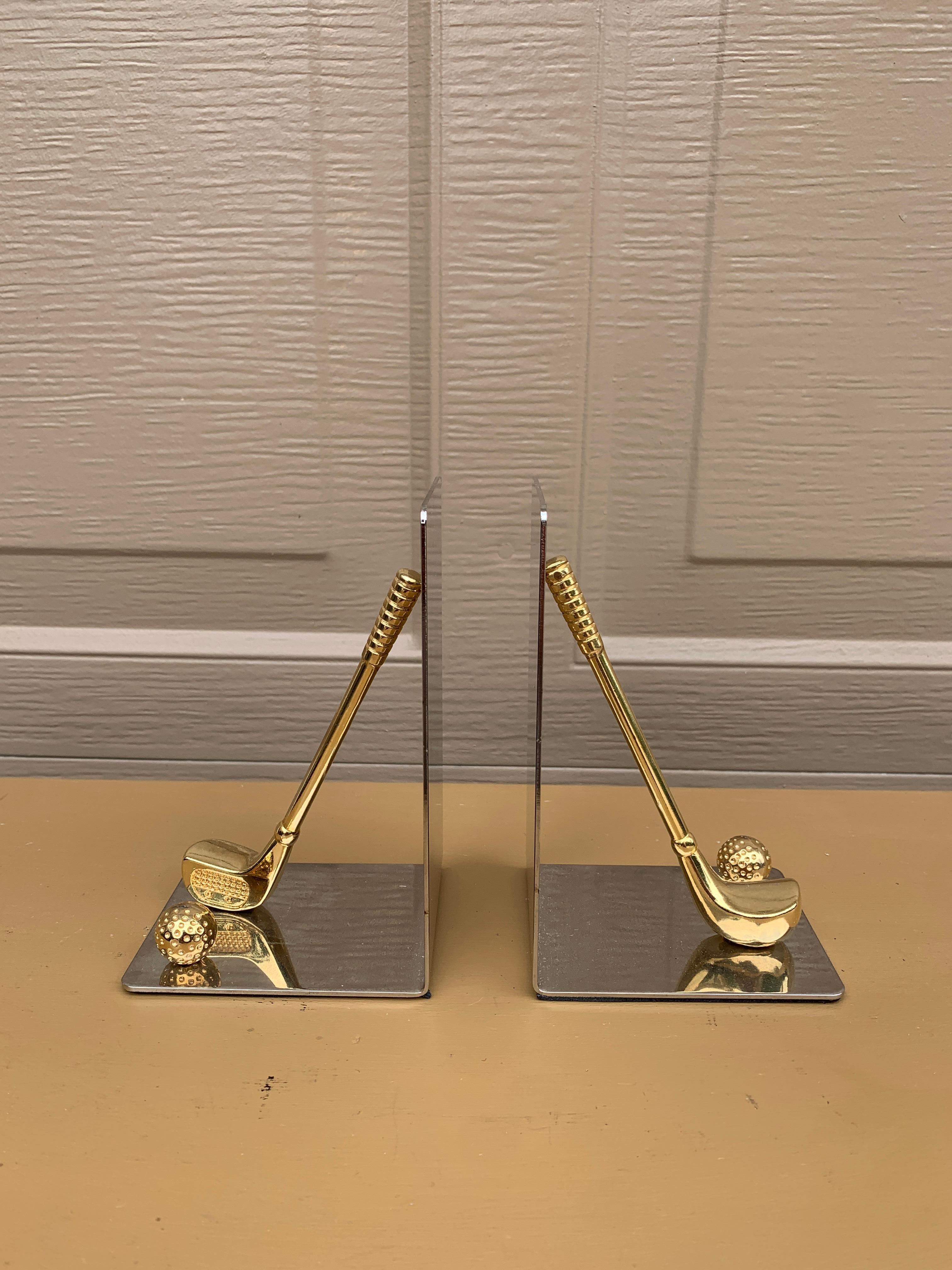 A beautiful pair of cast brass bookends in the form of golf clubs and golf balls.

Circa 1980s

Measures: 3.5