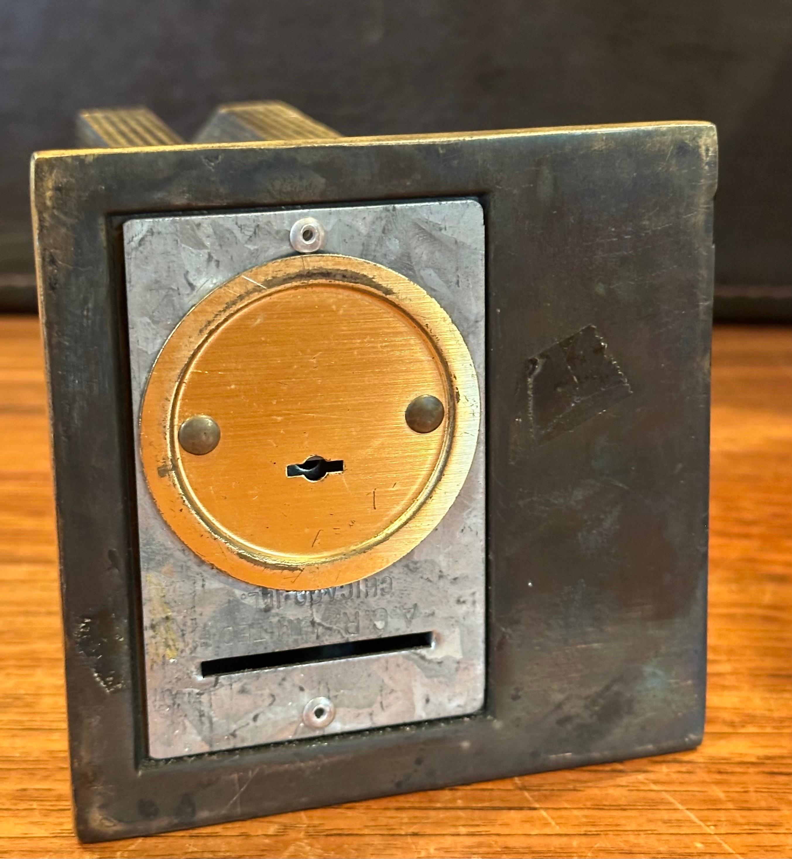 Banque en laiton coulé Vintage 