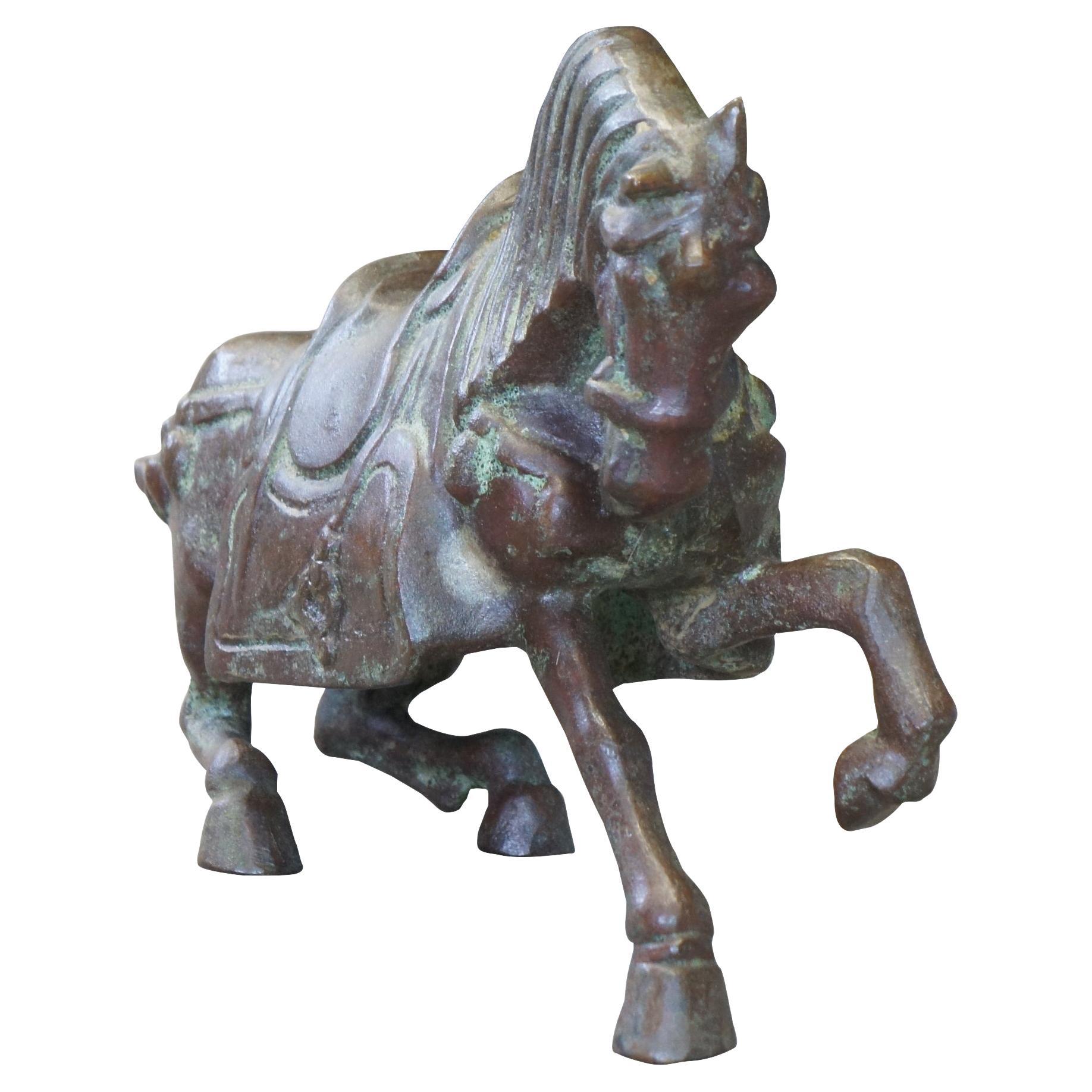 Vintage cast bronze Chinese Tang Dynasty Warrior horse sculpture or statue in the fighting pose. Measure 16