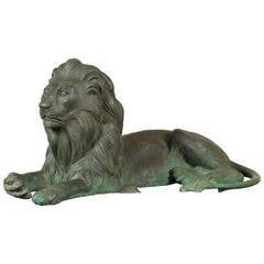 Vintage Cast Bronze Sculpture of a Reclining Lion with Verde Patina