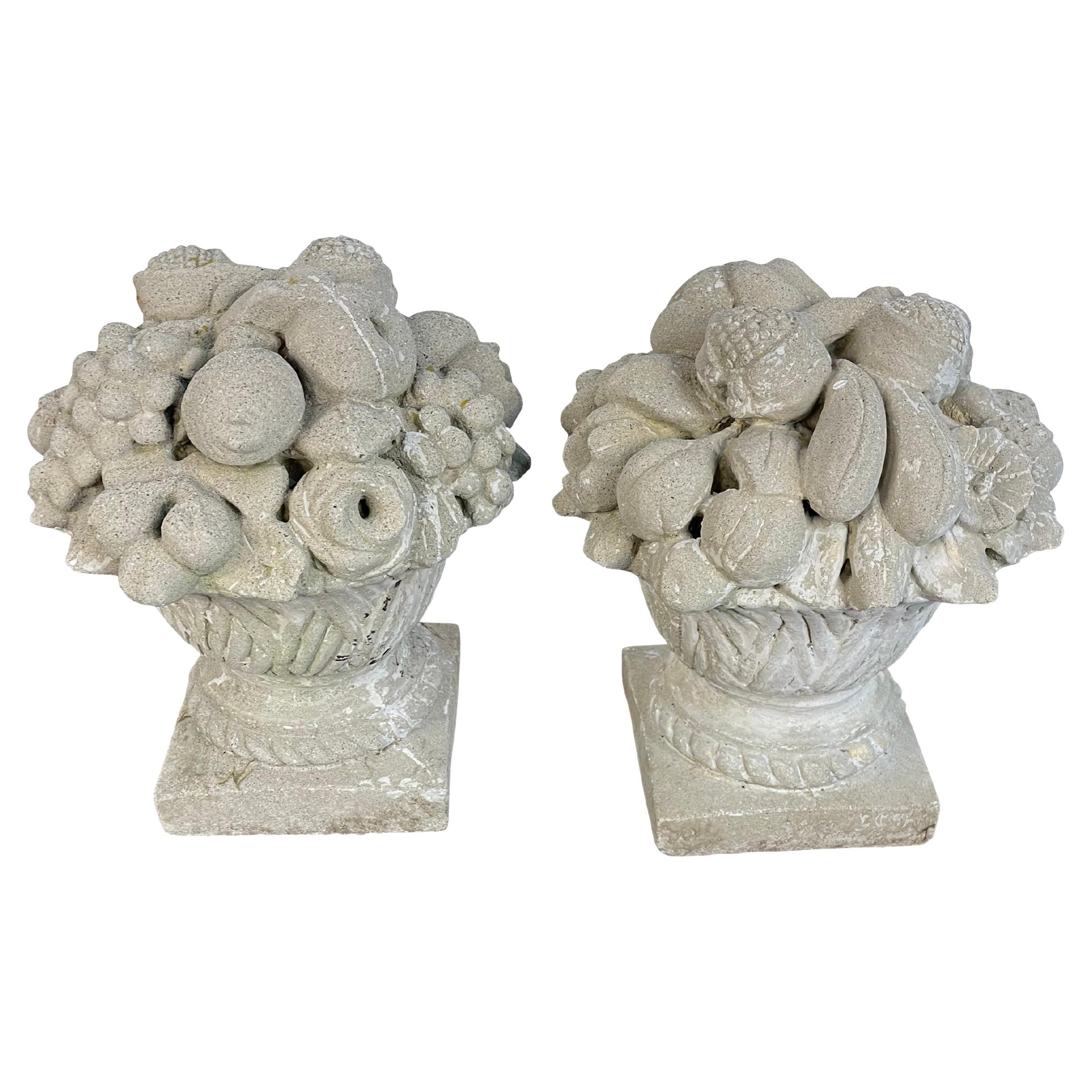 Vintage pair of cast stone fruit baskets in a nice size for indoor use or outdoors. Very good condition.  Well cast with lots of detail. 