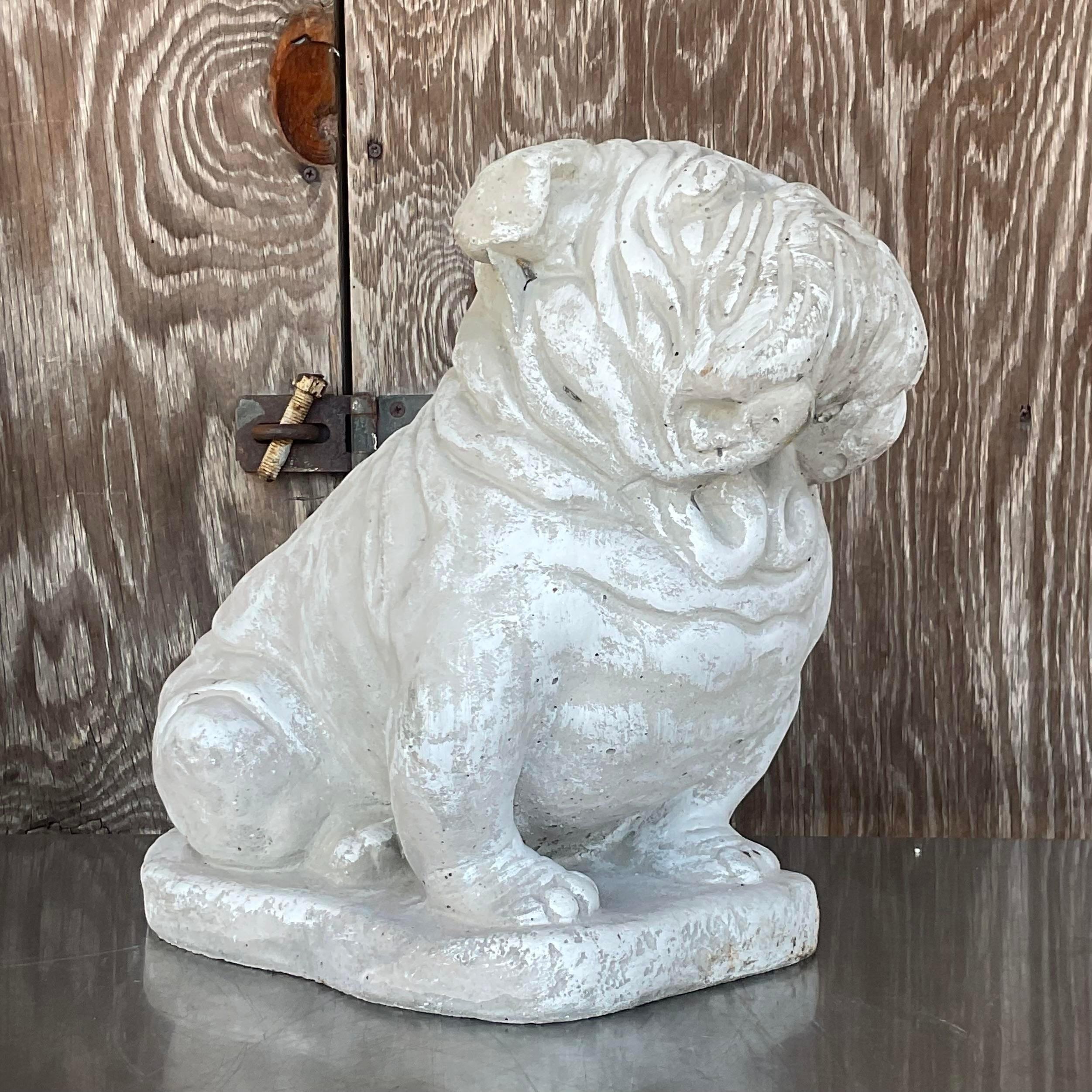A fabulous vintage Boho cast concrete statue. A charming bulldog ready to charm up any space. Perfect indoors our out. An excellent gift for your Georgia Bulldog loving friends. Acquired from a Palm Beach estate.