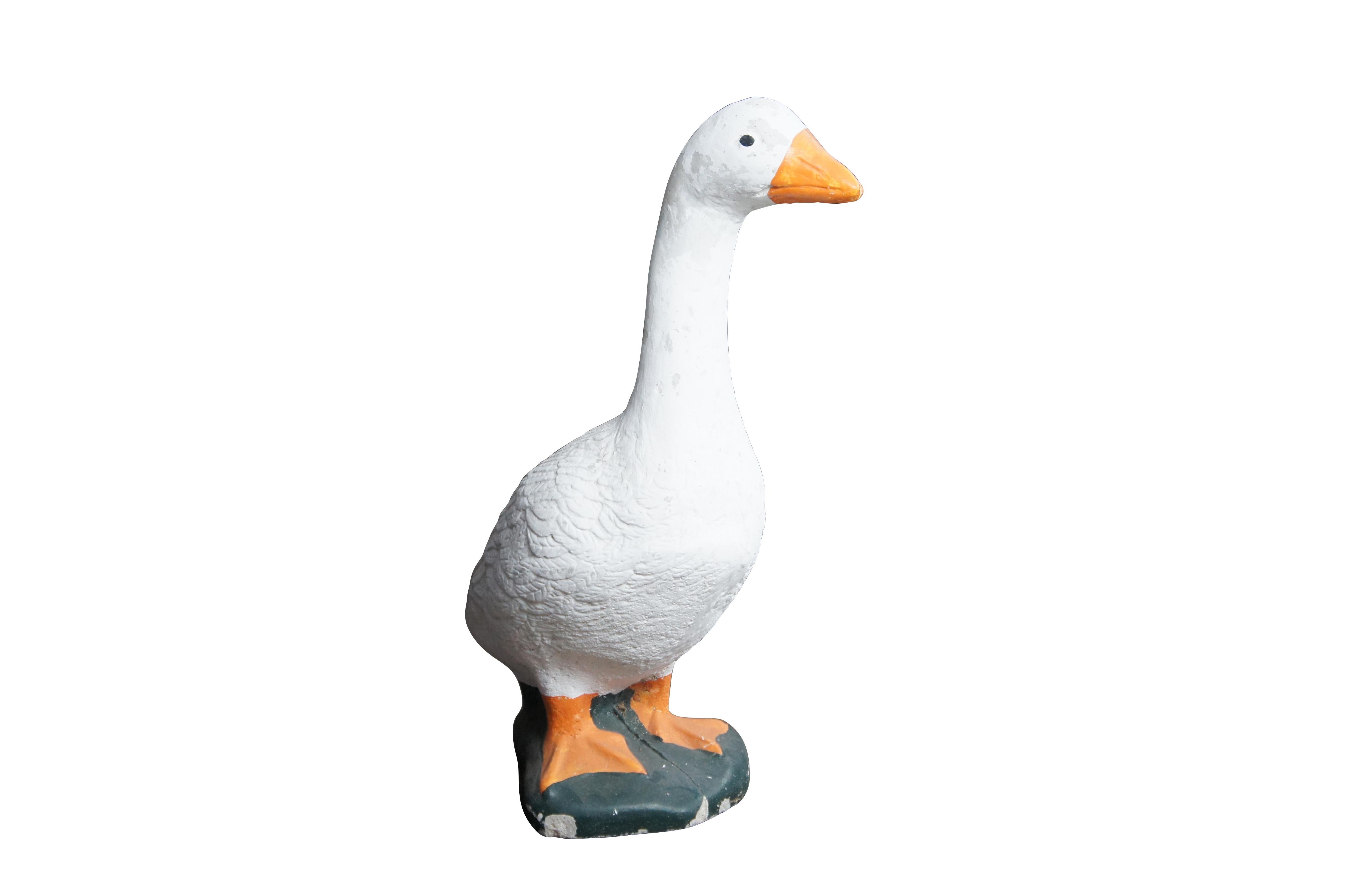 A fun cast concrete goose from the last quarter of the 20th century.  It features a traditional hand-painted motif.

Dimensions:
20