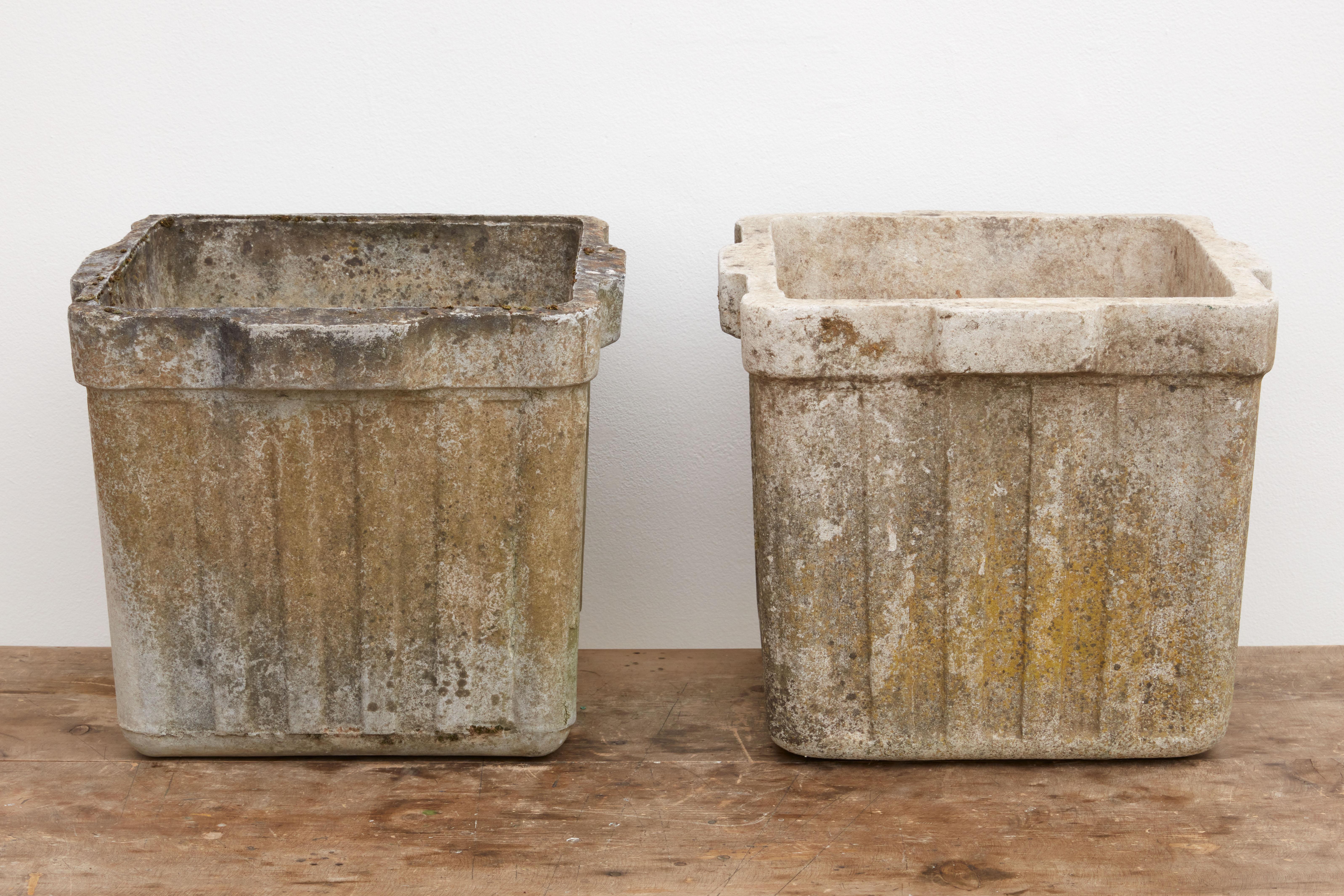 Pair of vintage cast concrete plant containers, retaining original lichen patina from its life outdoors, France circa 1960's.