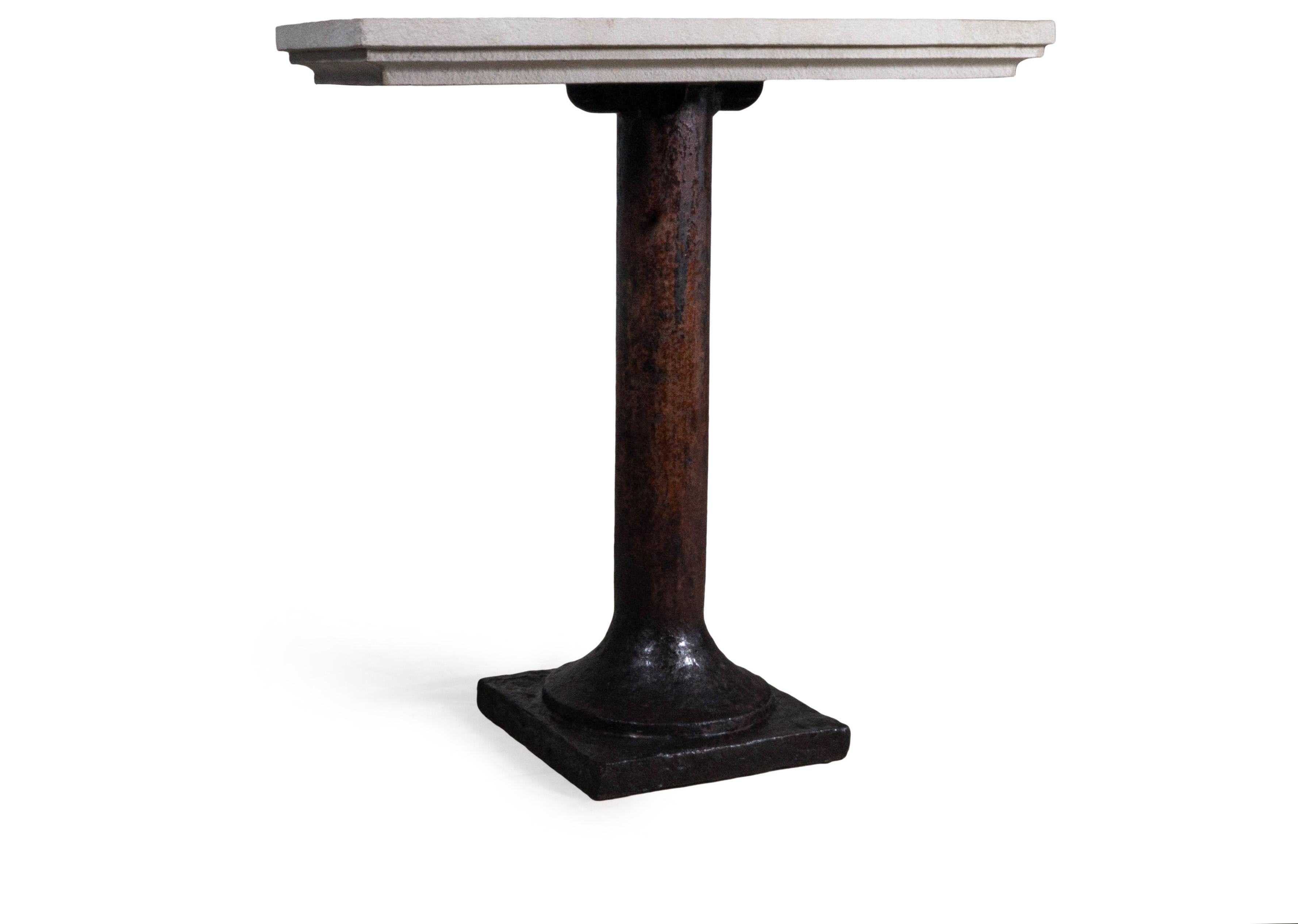 Industrial Vintage Cast Iron Architectural Column Supporting a Limestone Top For Sale