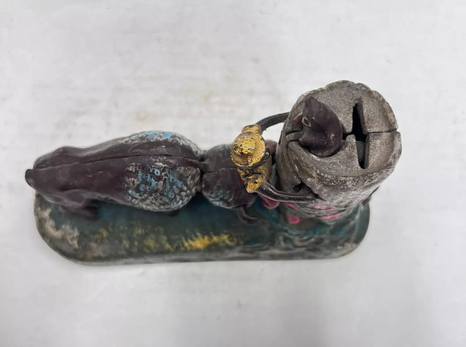 Vintage Cast Iron Book Of Knowledge Butting Buffalo Coin Piggy Bank In Good Condition For Sale In Philadelphia, PA