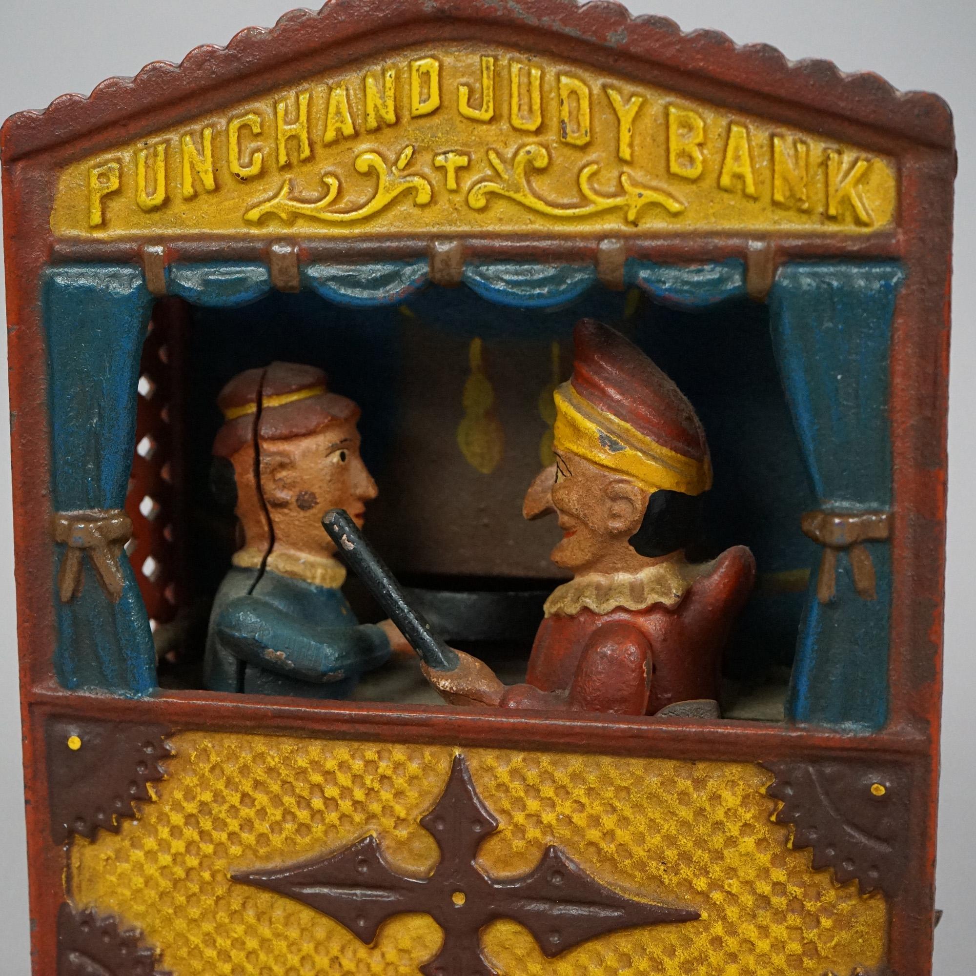 American Vintage Cast Iron Book of Knowledge Mechanical Bank, Punch & Judy, 20th Century