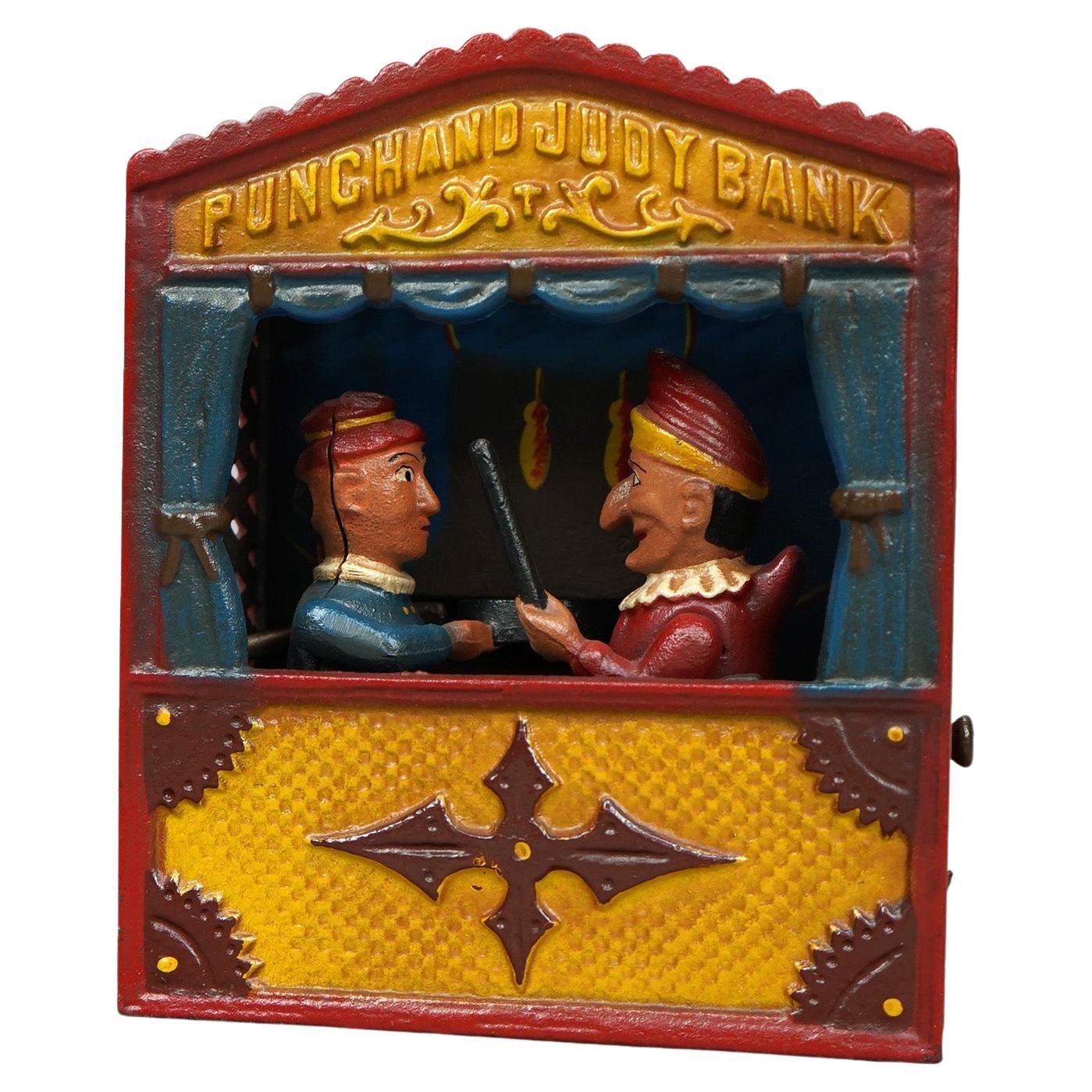 Vintage Cast Iron Book of Knowledge Mechanical Bank, Punch & Judy, 20th Century