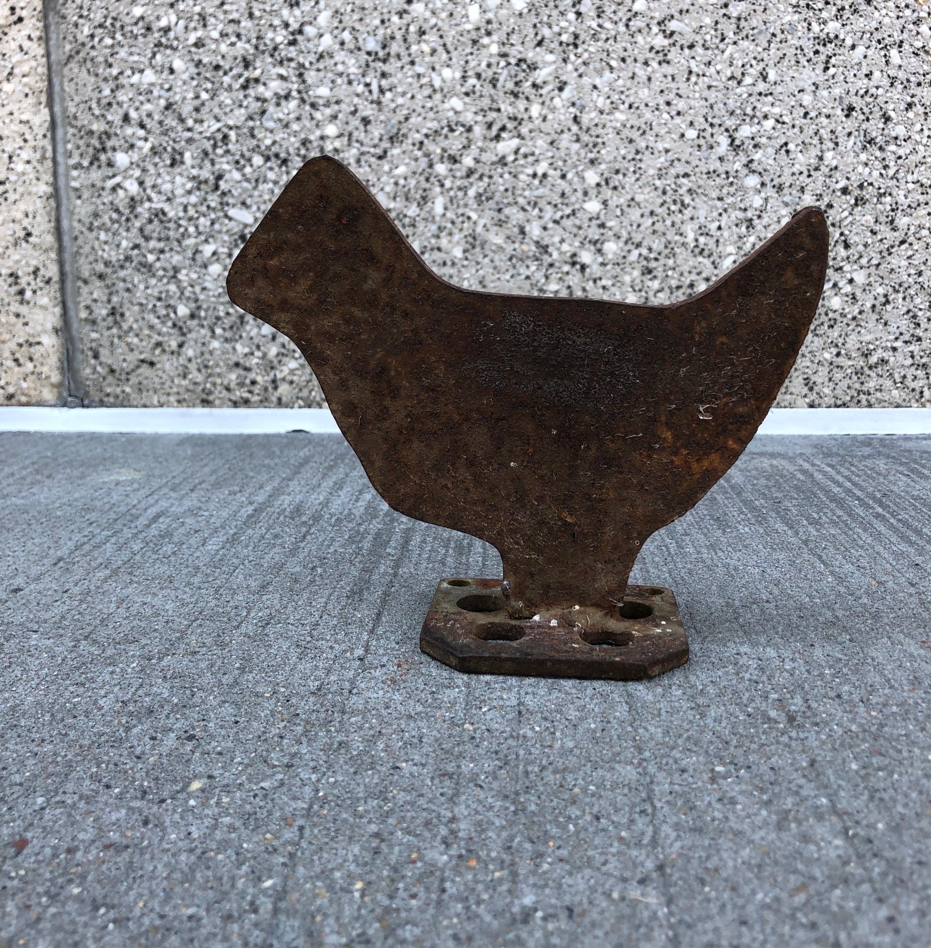 A truly adorable mid-century cast iron boot scraper in the form of a little chick. This one looks great and will bring a smile to your face.