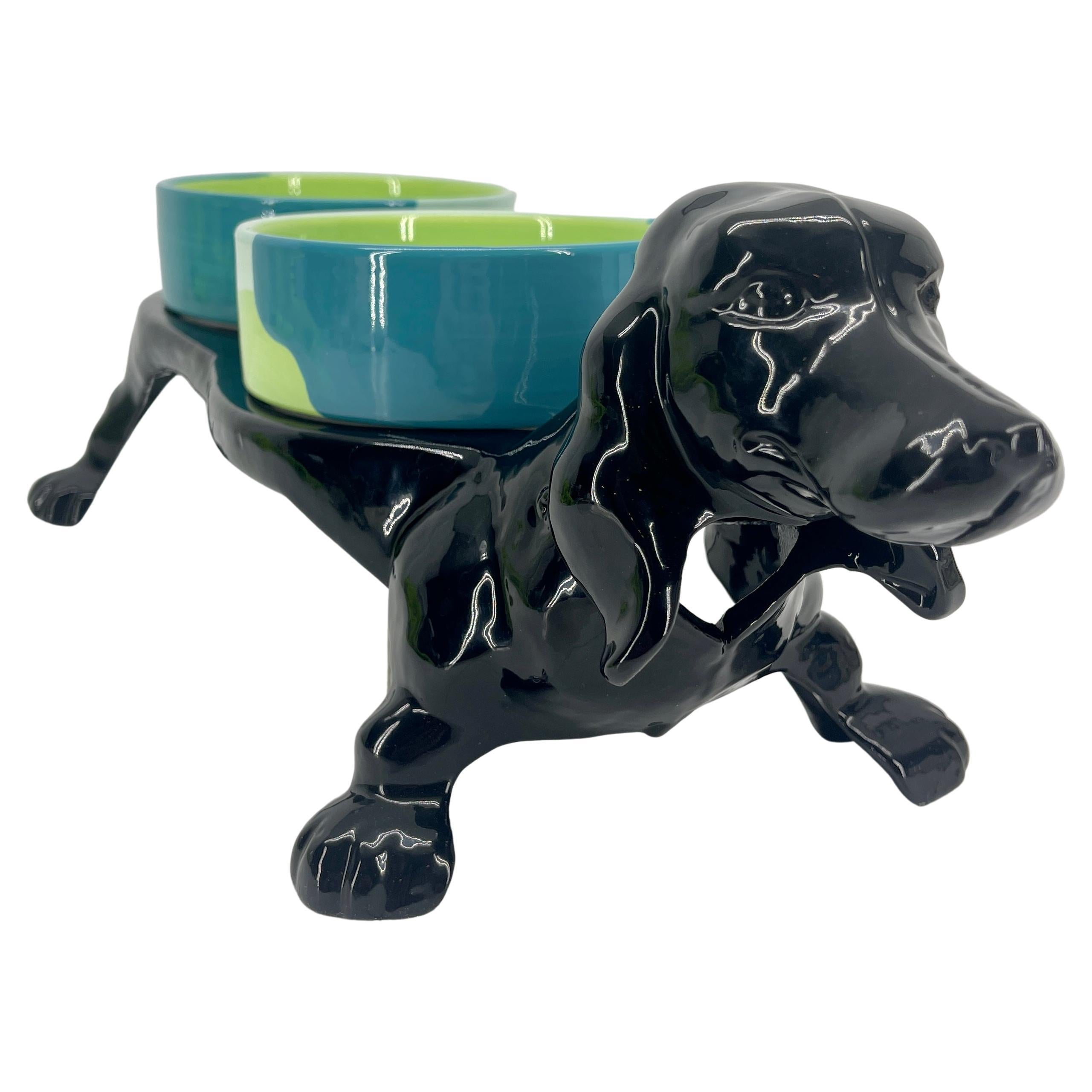 https://a.1stdibscdn.com/vintage-cast-iron-dachshund-dog-bowl-feeder-circa-1920s-for-sale/f_9434/f_285784821652073669861/f_28578482_1652073670980_bg_processed.jpg