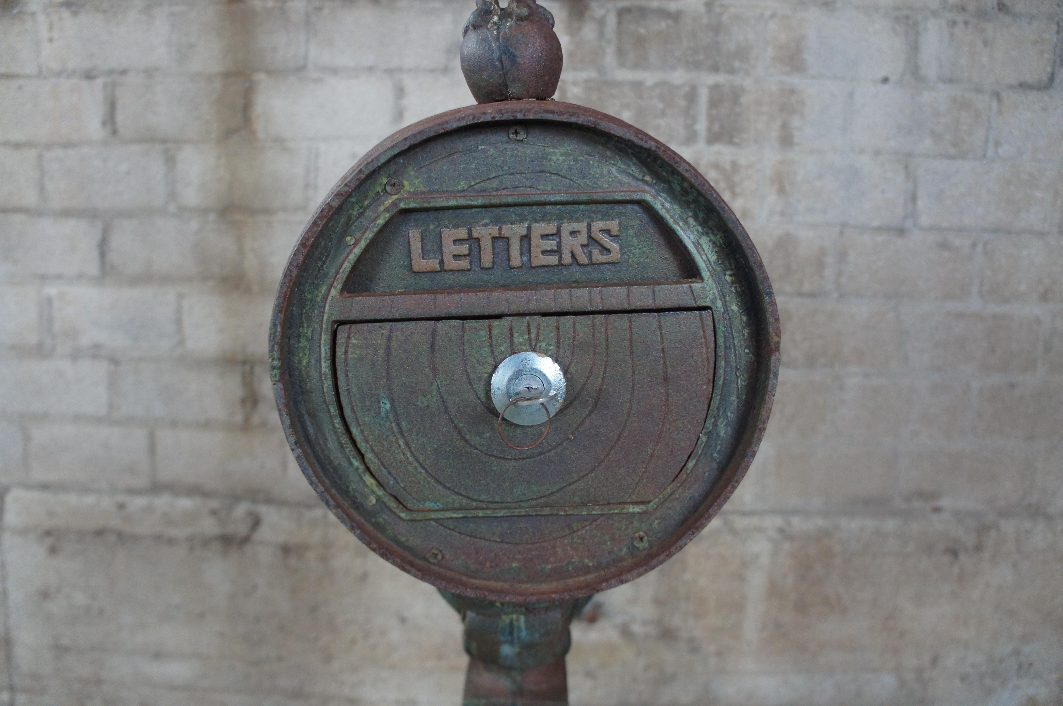antique cast iron standing mailbox