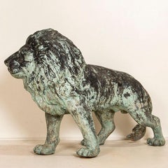 Vintage Cast Iron Lion Garden Sculpture with Aged Verdigris Finish