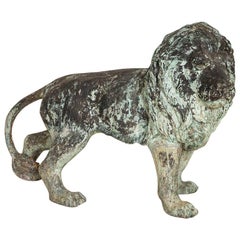 Vintage Cast Iron Lion Garden Sculpture with Aged Verdigris Finish