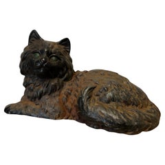 Cale-porte / sculpture vintage en fonte patinée, chat noir aux yeux verts par Hubley