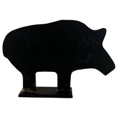 Tope de puerta vintage de hierro fundido con silueta de cerdo