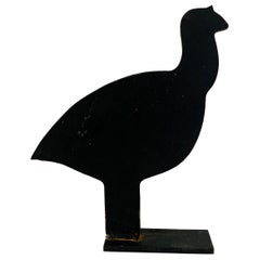 Tope de puerta vintage de hierro fundido con silueta de codorniz