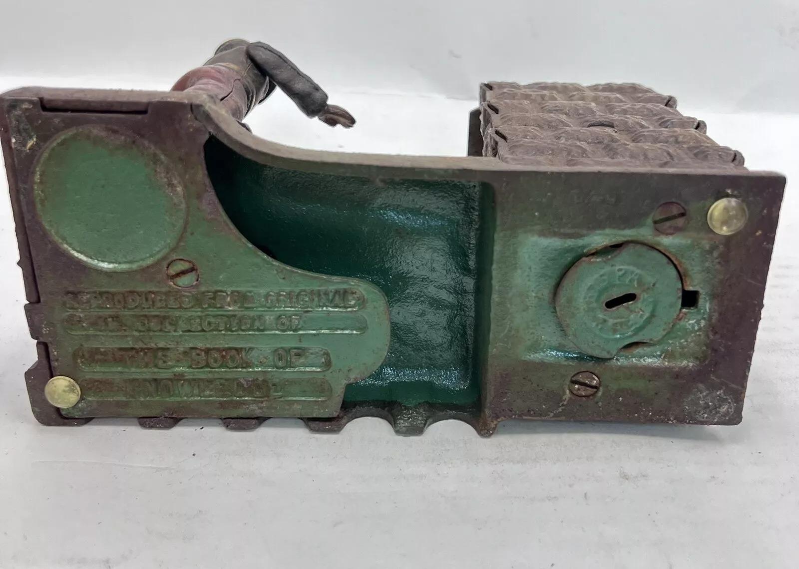 Vintage Cast Iron Still Bank Artillery Bank Coin Bank Book of Knowledge 1