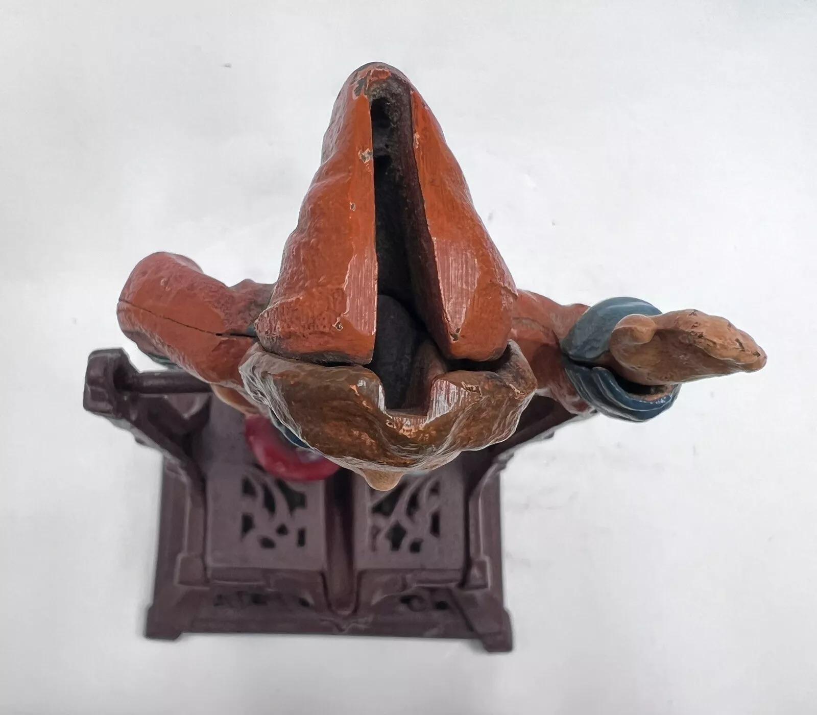 Vintage Cast Iron Still Bank Boy On Trapeze Book Of Knowledge Mechanical Bank In Good Condition In Philadelphia, PA