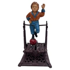 Vintage Cast Iron Still Bank Boy On Trapeze Book Of Knowledge Mechanical Bank