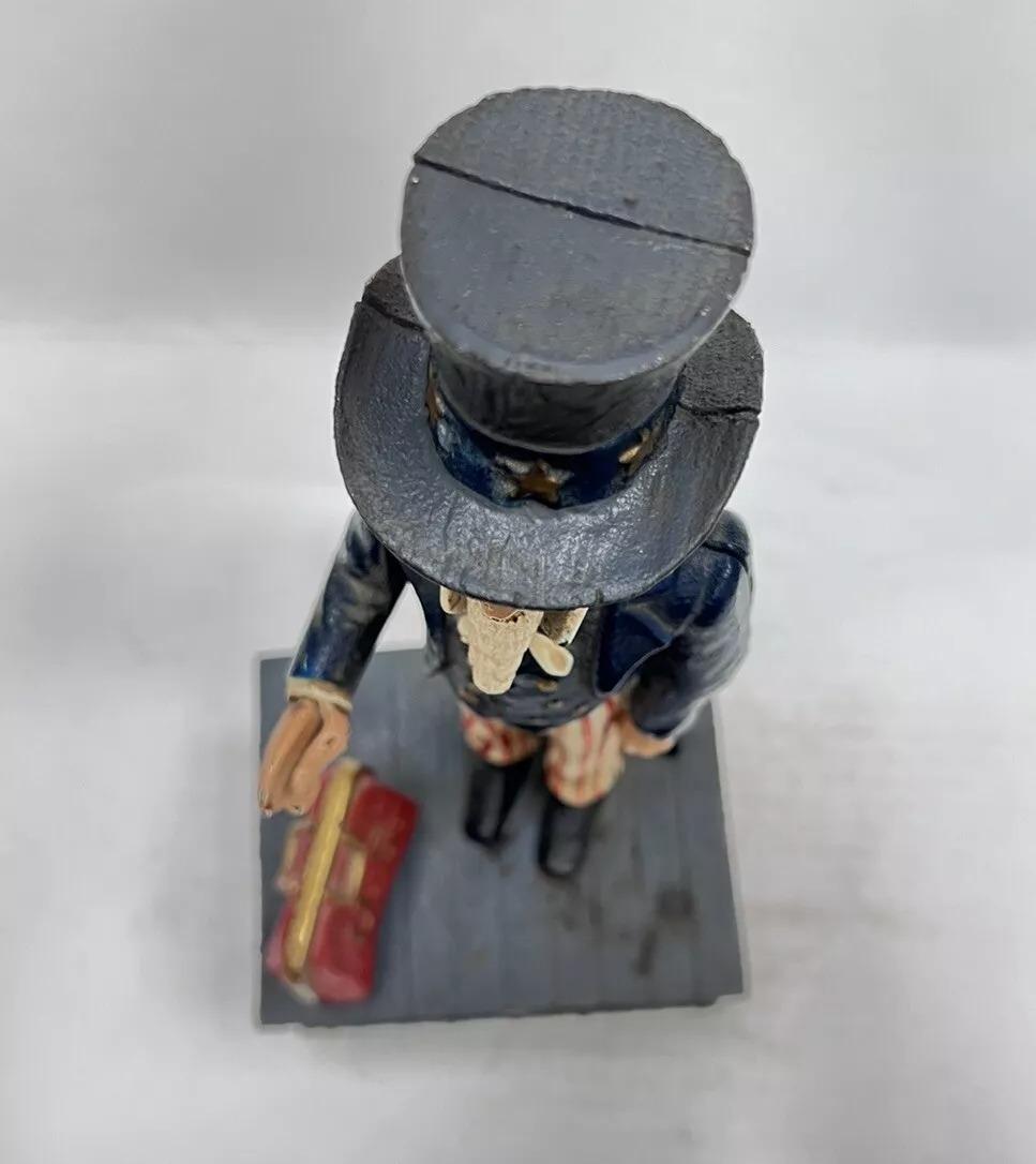 Vintage Cast Iron Still Bank Uncle Sam Novelty Bank Book of Knowledge In Good Condition For Sale In Philadelphia, PA