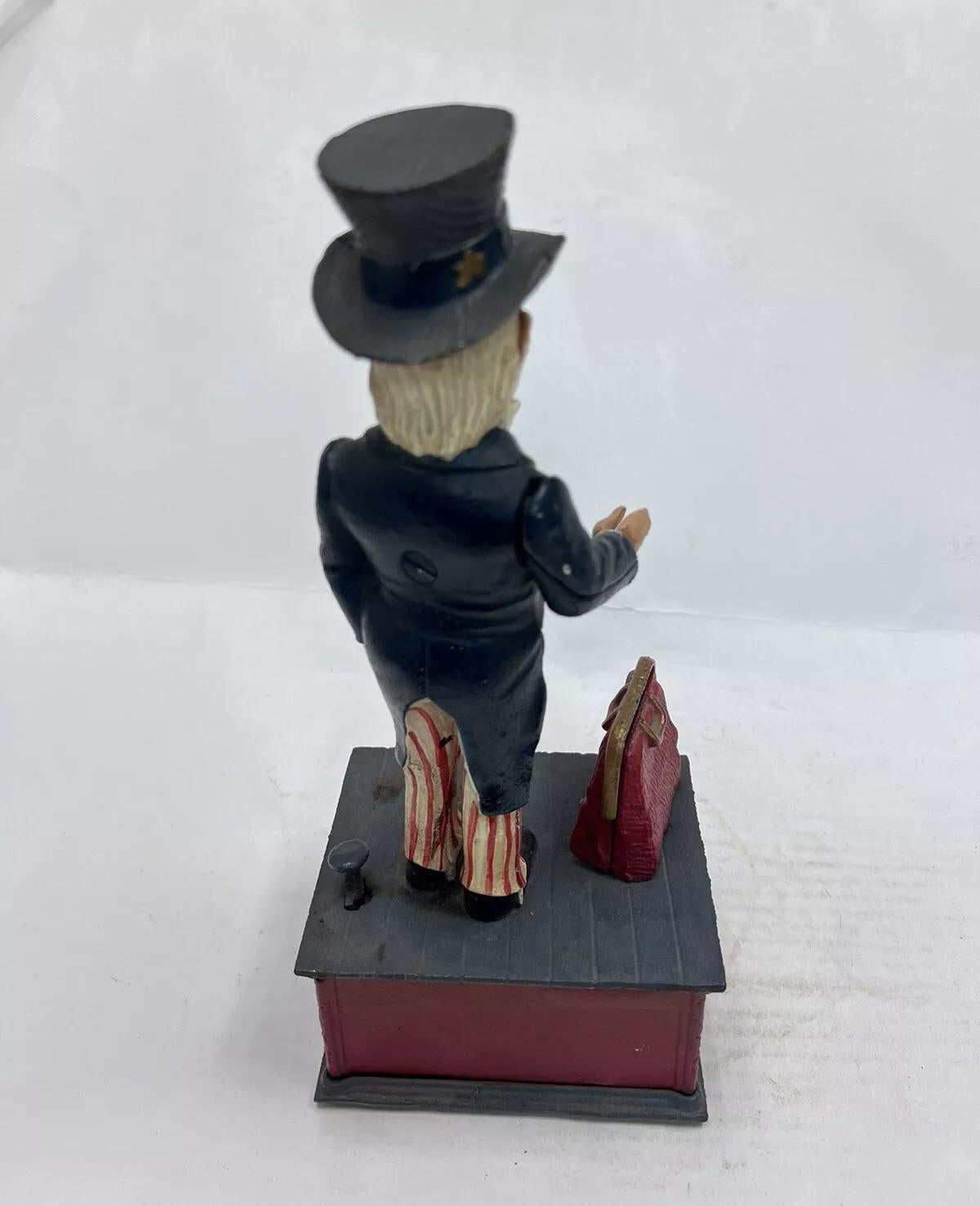 20th Century Vintage Cast Iron Still Bank Uncle Sam Novelty Bank Book of Knowledge For Sale