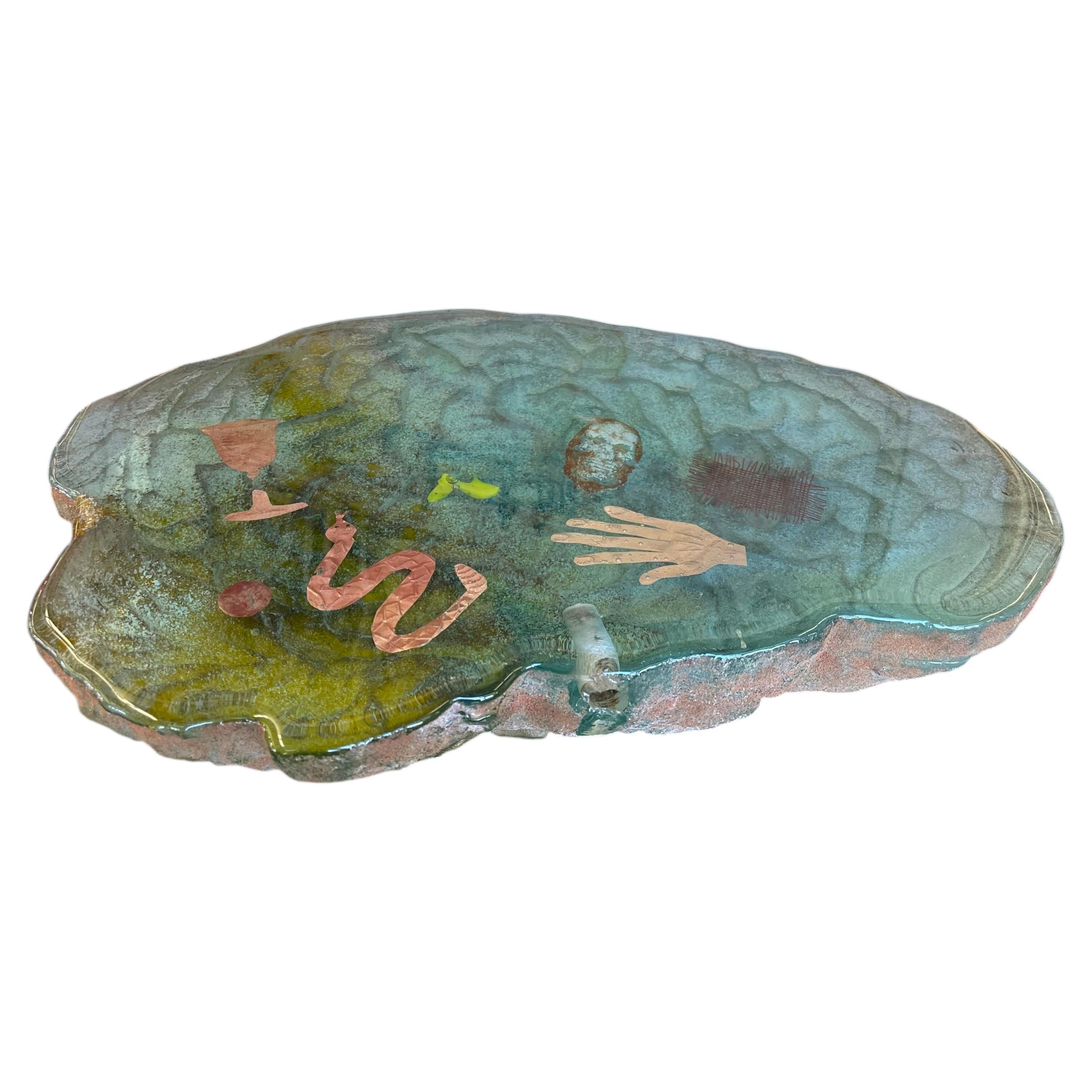 Vintage Cast Sculptural Art Piece with Embedded Figural Motifs and Textured Base
