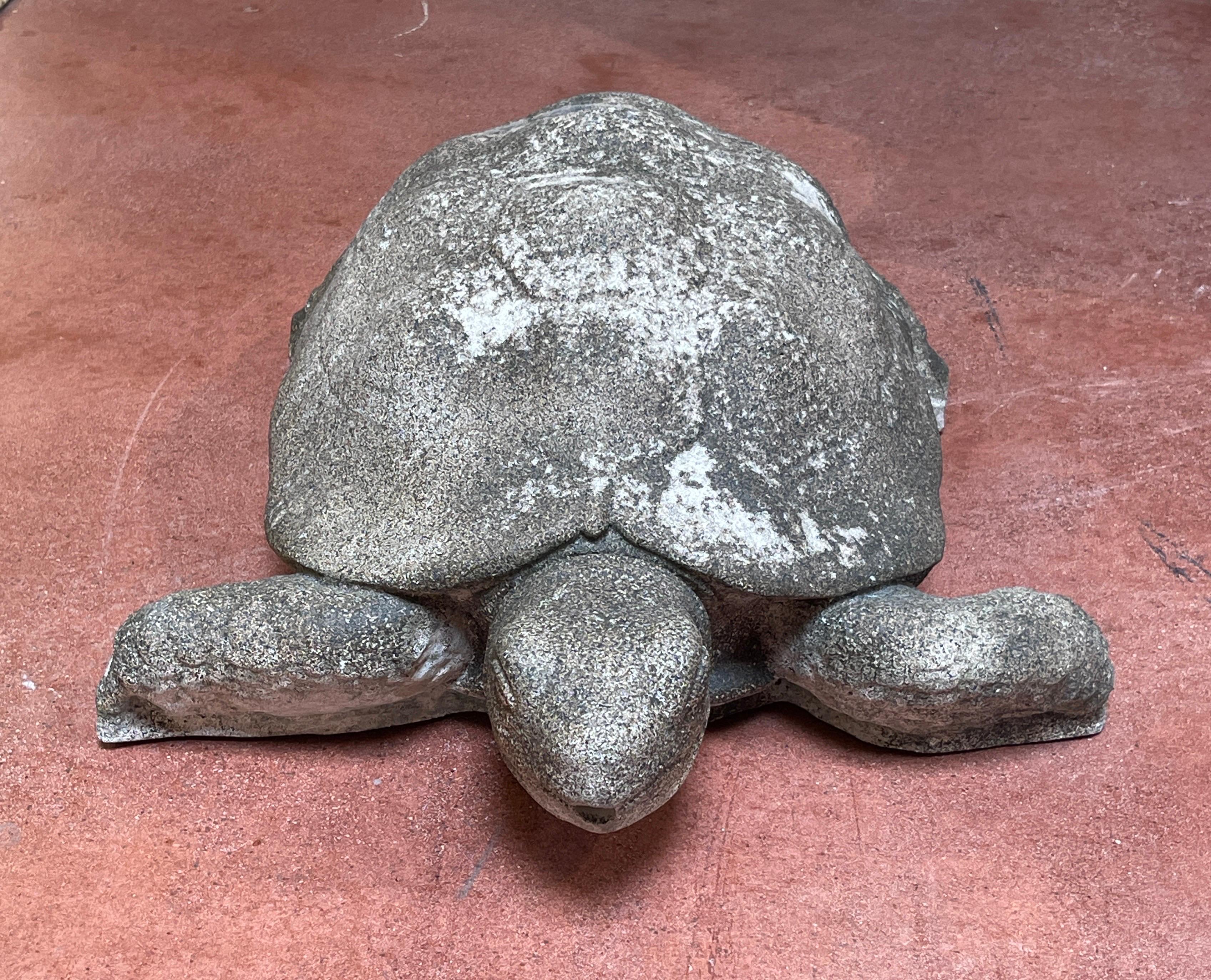 Vintage Cast Stone Life Size Model of a Sea Turtle Fountain 
USA, Circa 1950s

A well cast, realistically modeled, engraved figure of a sea turtle, with an optional use as a fountain. This work is  fitted/drilled for a fountain, no fountain works