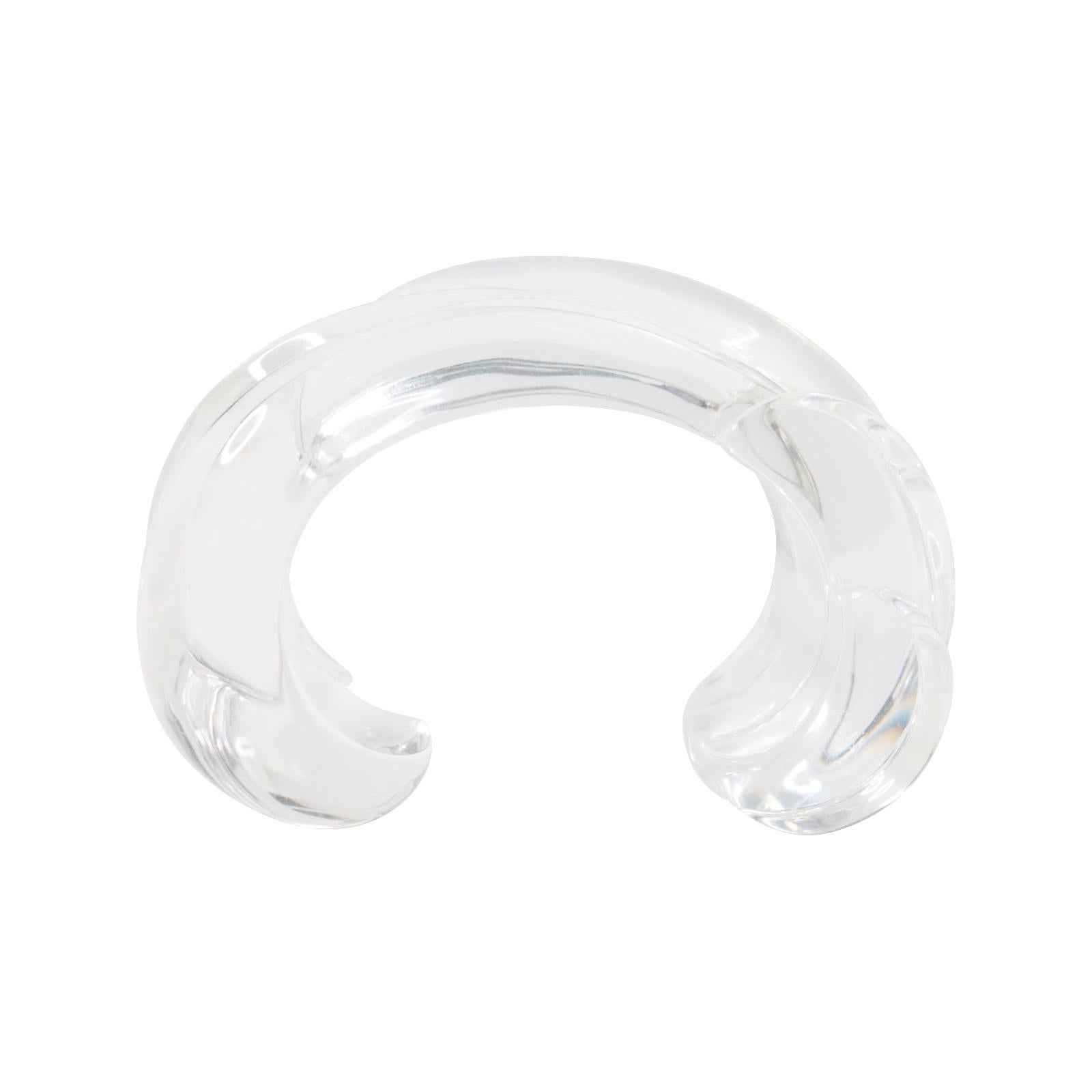 Vintage Catherine Knoll Lucite Cuff Bracelet Circa 1980s.  It is substantial and well-made.  It will look great worn alone as a statement piece or with other stackable pieces.  It is truly very clean, with no marks on it at all. 

This bracelet is