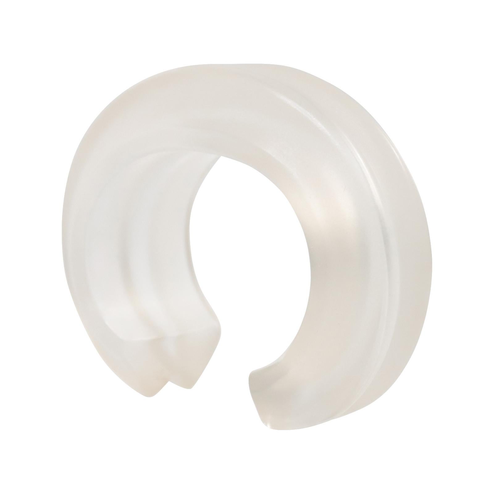 Vintage Catherine Knoll Opague Lucite Cuff Bracelet Circa 1980s.  It is substantial and well-made.  It will look great worn alone as a statement piece or with other stackable pieces.  It is truly very clean, with no marks on it at all. 

This
