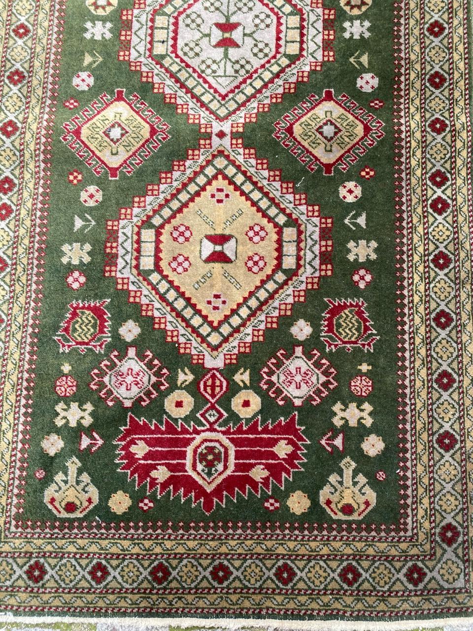 Beautiful vintage runner with nice chirwan design and beautiful colors with green field, yellow, purple and pink, entirely hand knotted with wool velvet on cotton foundation.