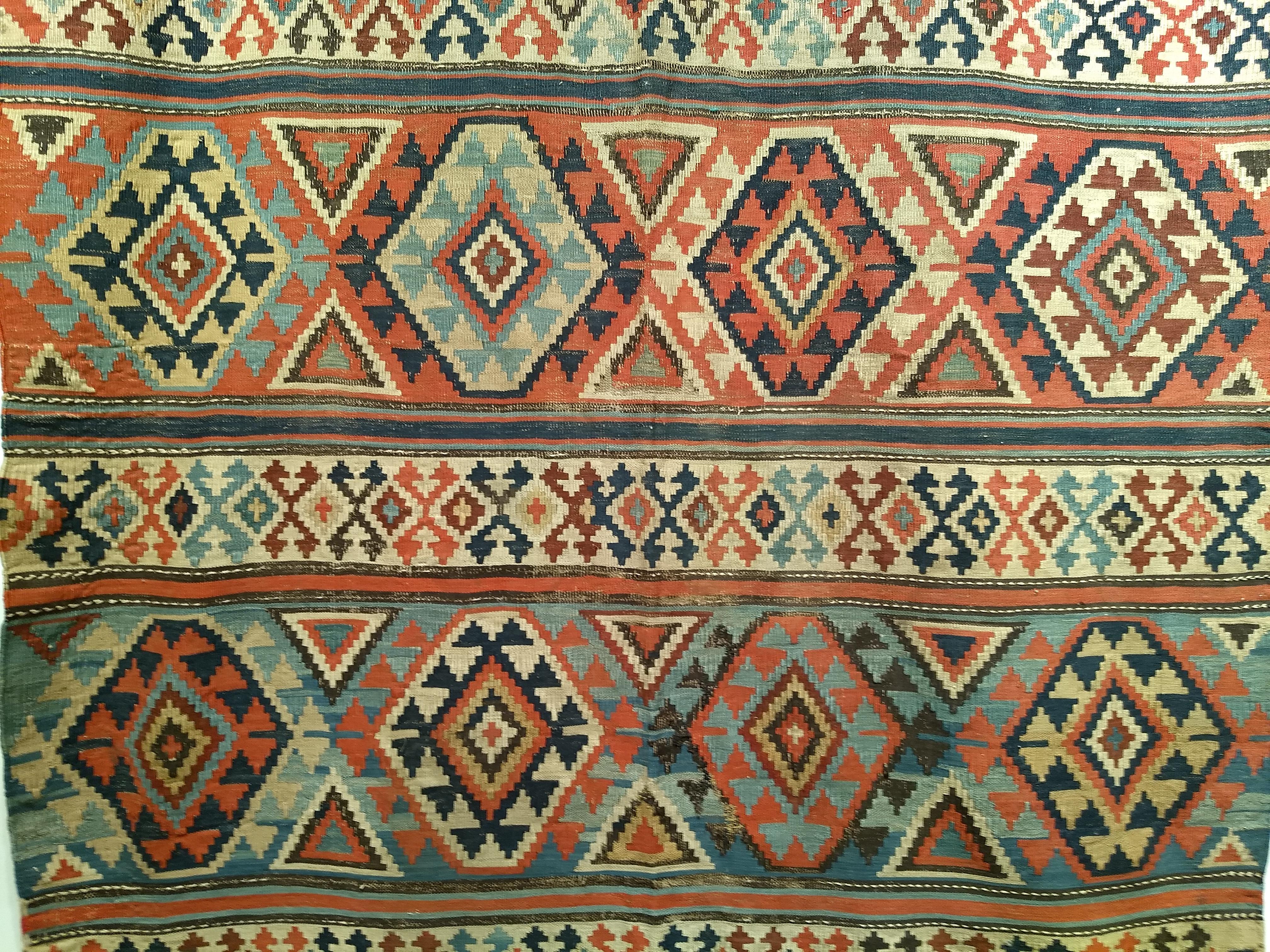 Wool Vintage Caucasian Kazak Kilim in Geometric Pattern in Ivory, Green, Rust, Blue For Sale