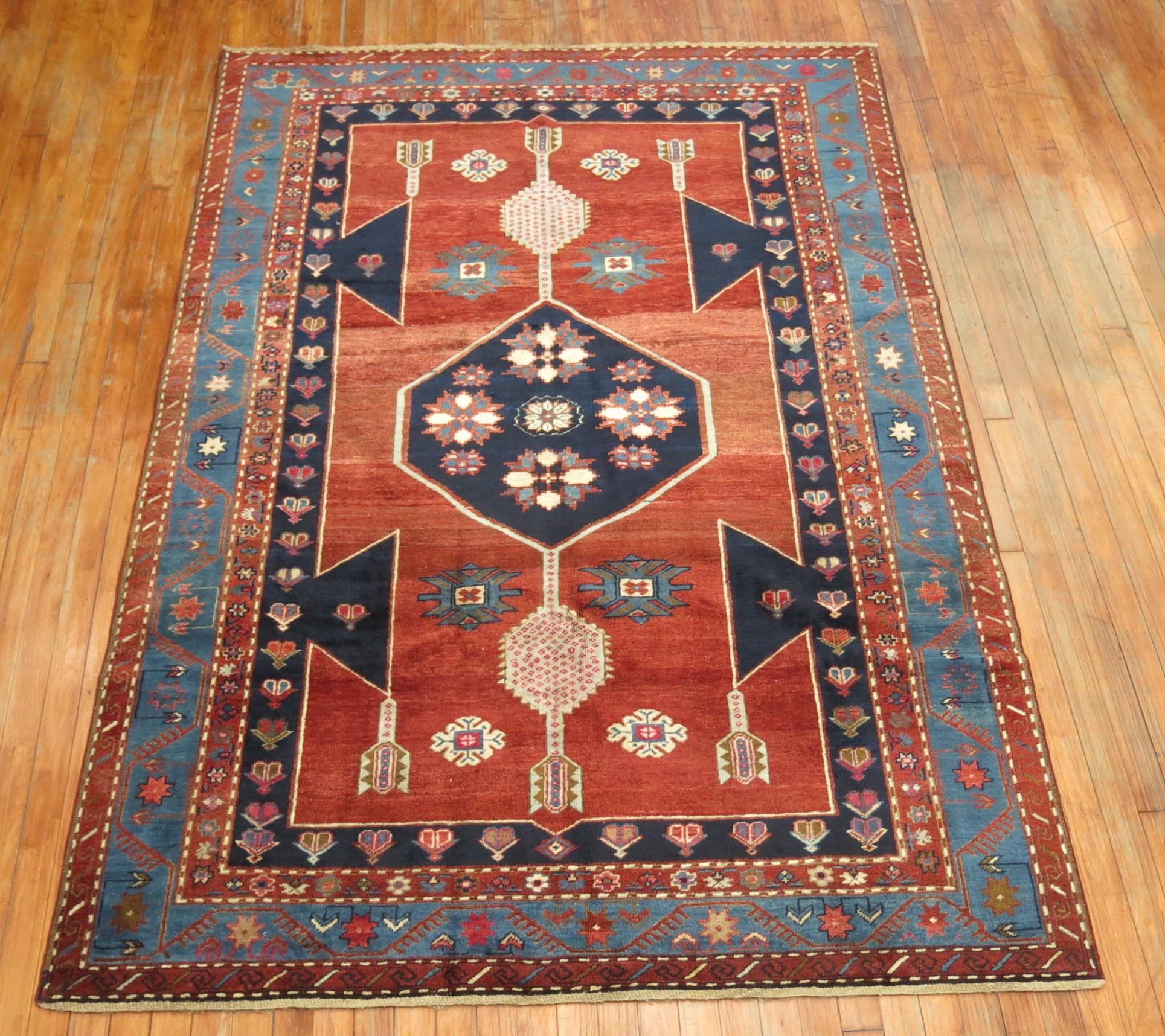 An authentic decorative vintage Kazak rug.
