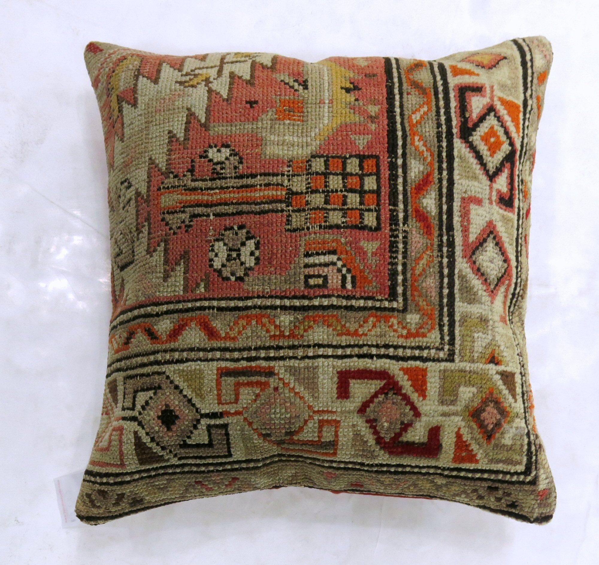 Pillow made from a vintage Caucasian rug.

Measures: 19'' x 19''.