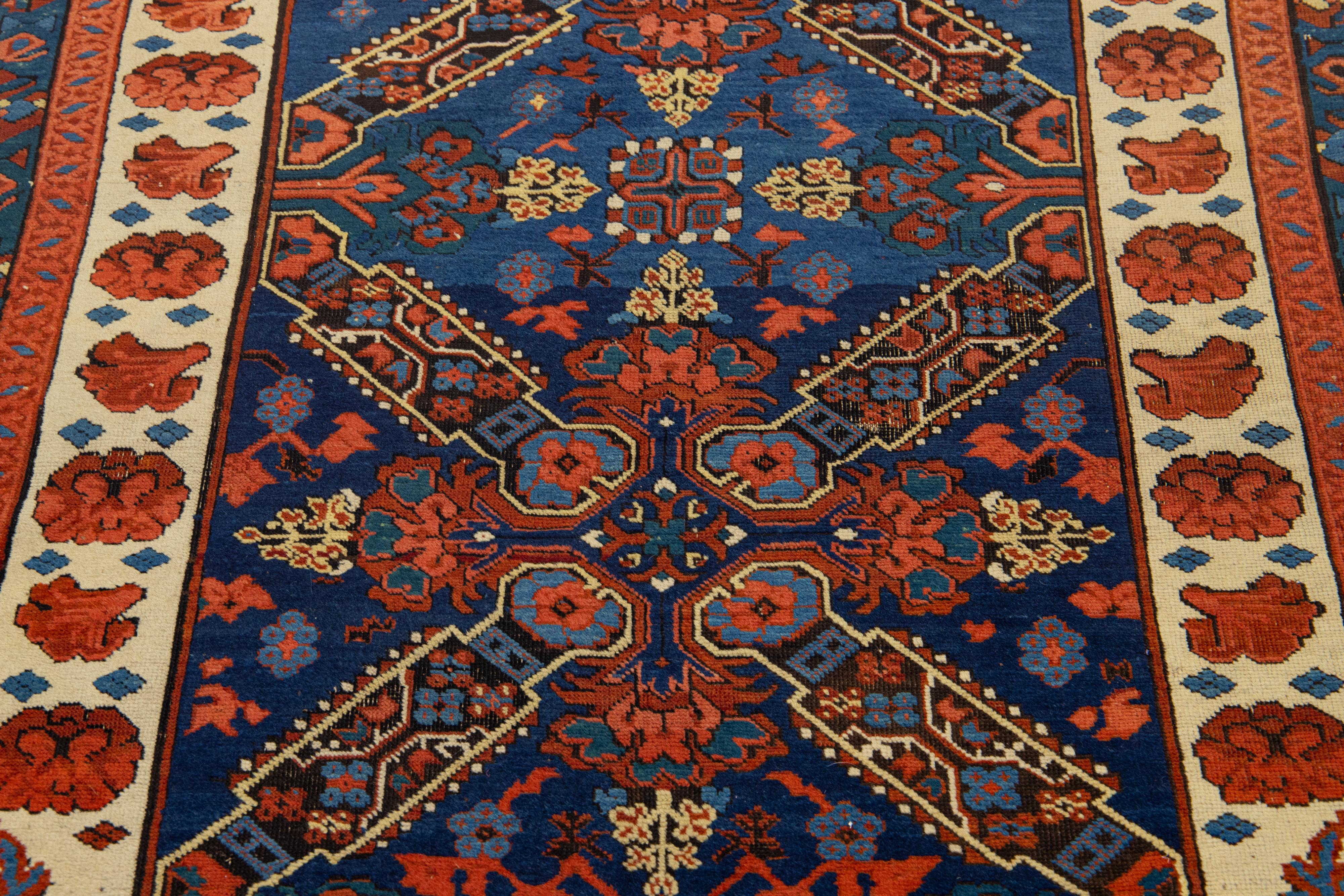 Early 20th Century Vintage Caucasian Seychour  Handmade Wool Rug in Navy Blue With Tribal Motif For Sale