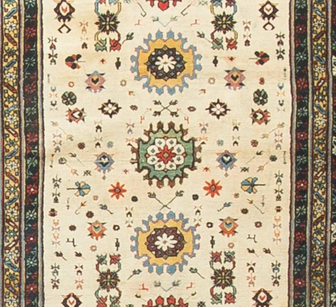 These types of antique Caucasian rugs were woven in the eastern part of the region, mostly along the west coast of the Caspian Sea. They display intricate designs, often in prayer (niche) formats; shorter, often velvety piles; complex color