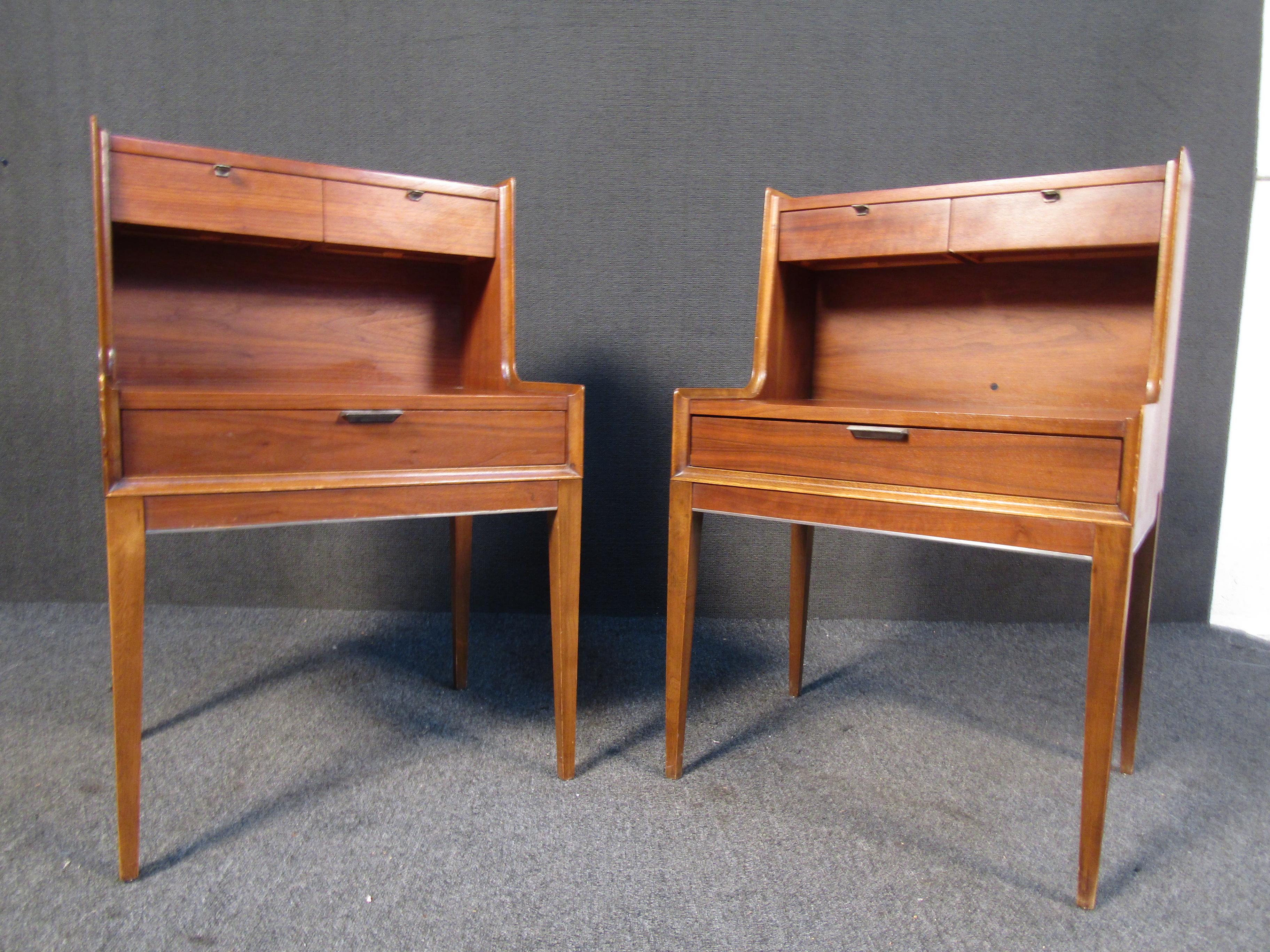 A pair of vintage Cavalier nightstands featuring tall legs and three drawers in a two-tier fashion. Wether its the aesthetic wood finish or elegant appearance these nightstands will make a great addition to any home or office space. 
Please confirm