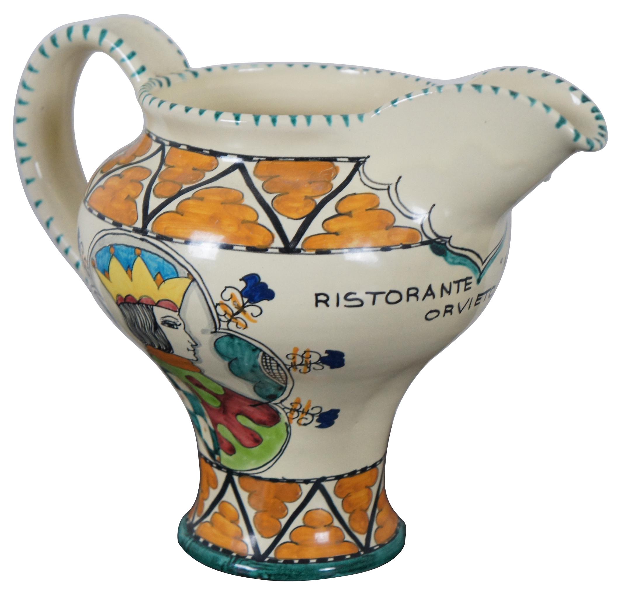 Vintage hand painted Italian ceramic pottery pitcher with ice lip, marked for Ristorante “Ancora” of Orvieto, Italy made by Cecconi Orvieto. Measures: 9”.
  