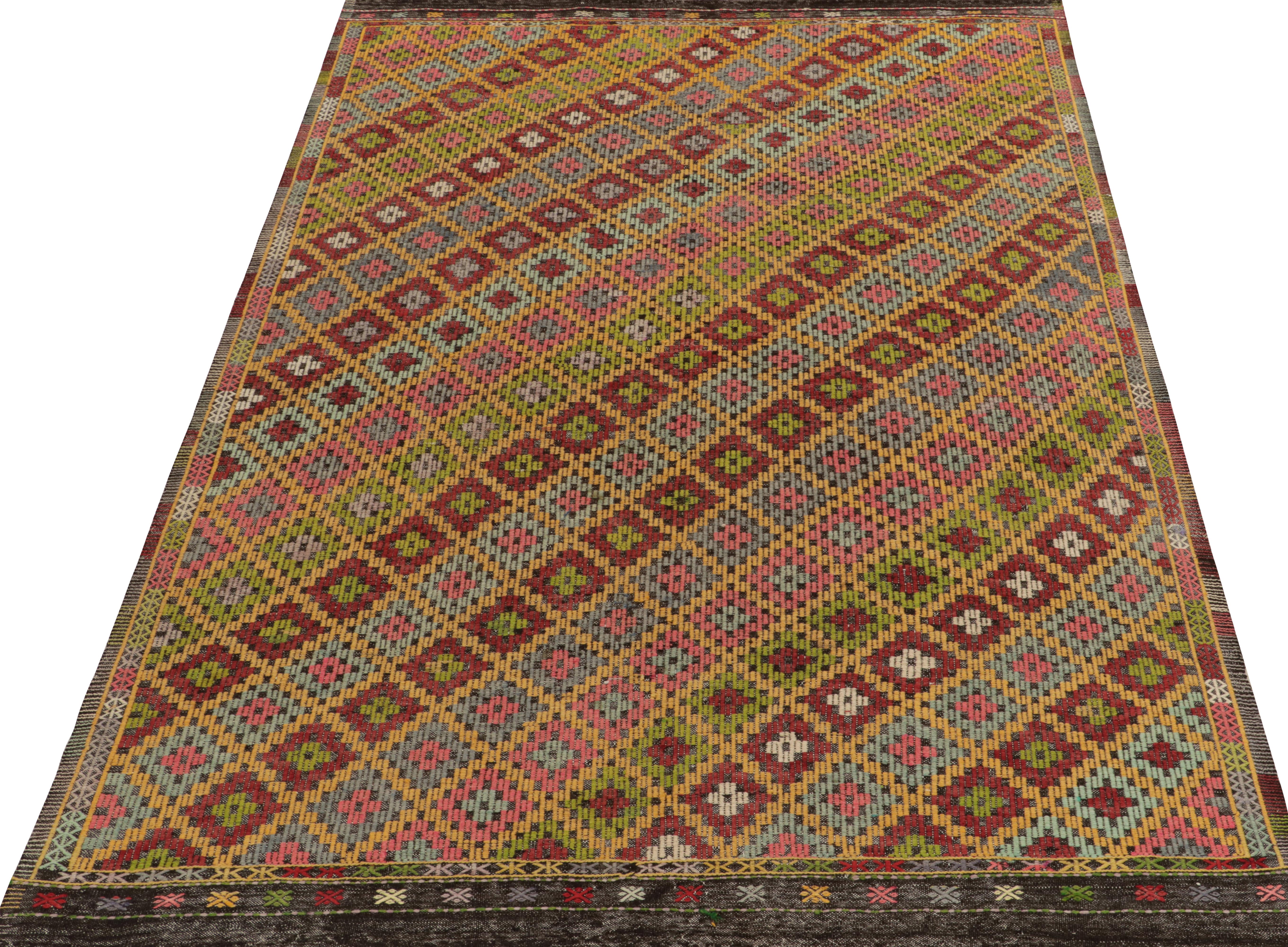 Remarking the celebrated Kurdish style, this 7 x 10 Cecim kilim rug of Anatolian sensibility is a prestigious addition to our collection. This vintage mid-century flatweave from Turkey features an embroidered lattice pattern manifesting as a rare