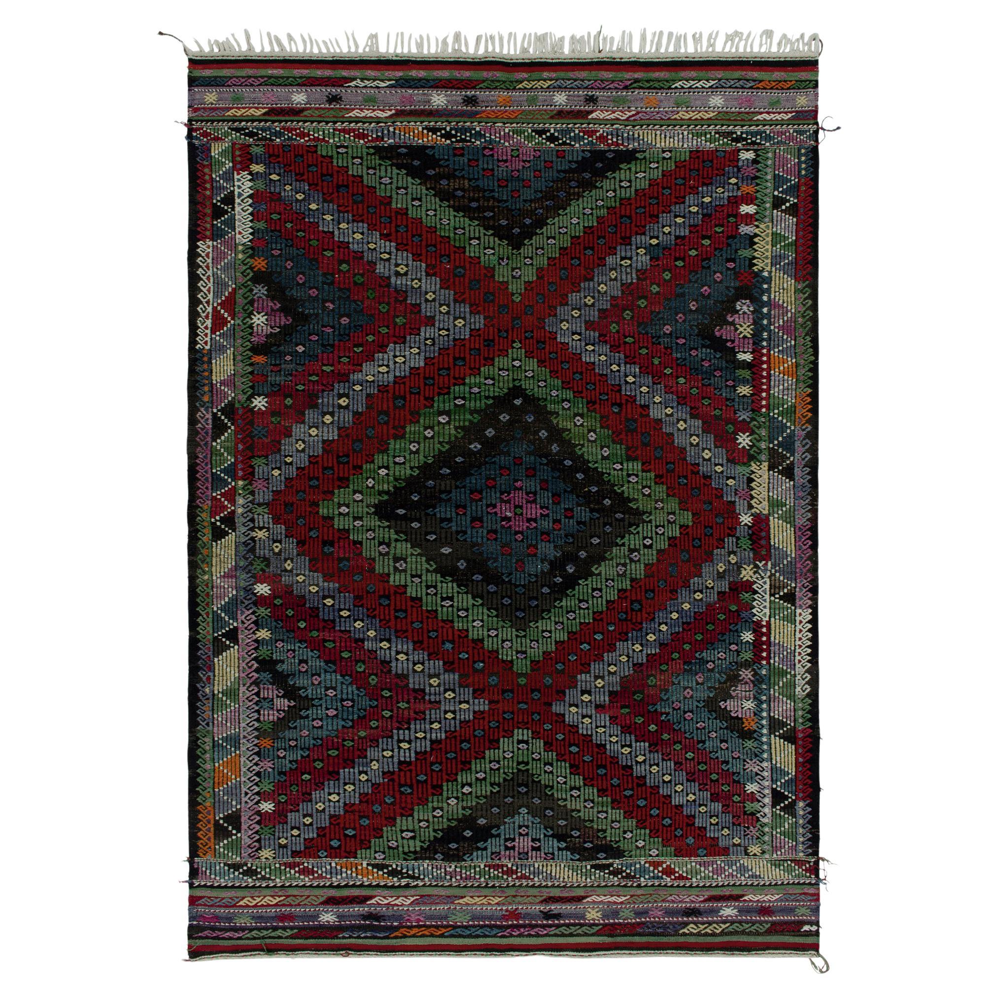 Tapis Kilim tribal vintage en motifs géométriques brodés multicolores par Rug & kilim