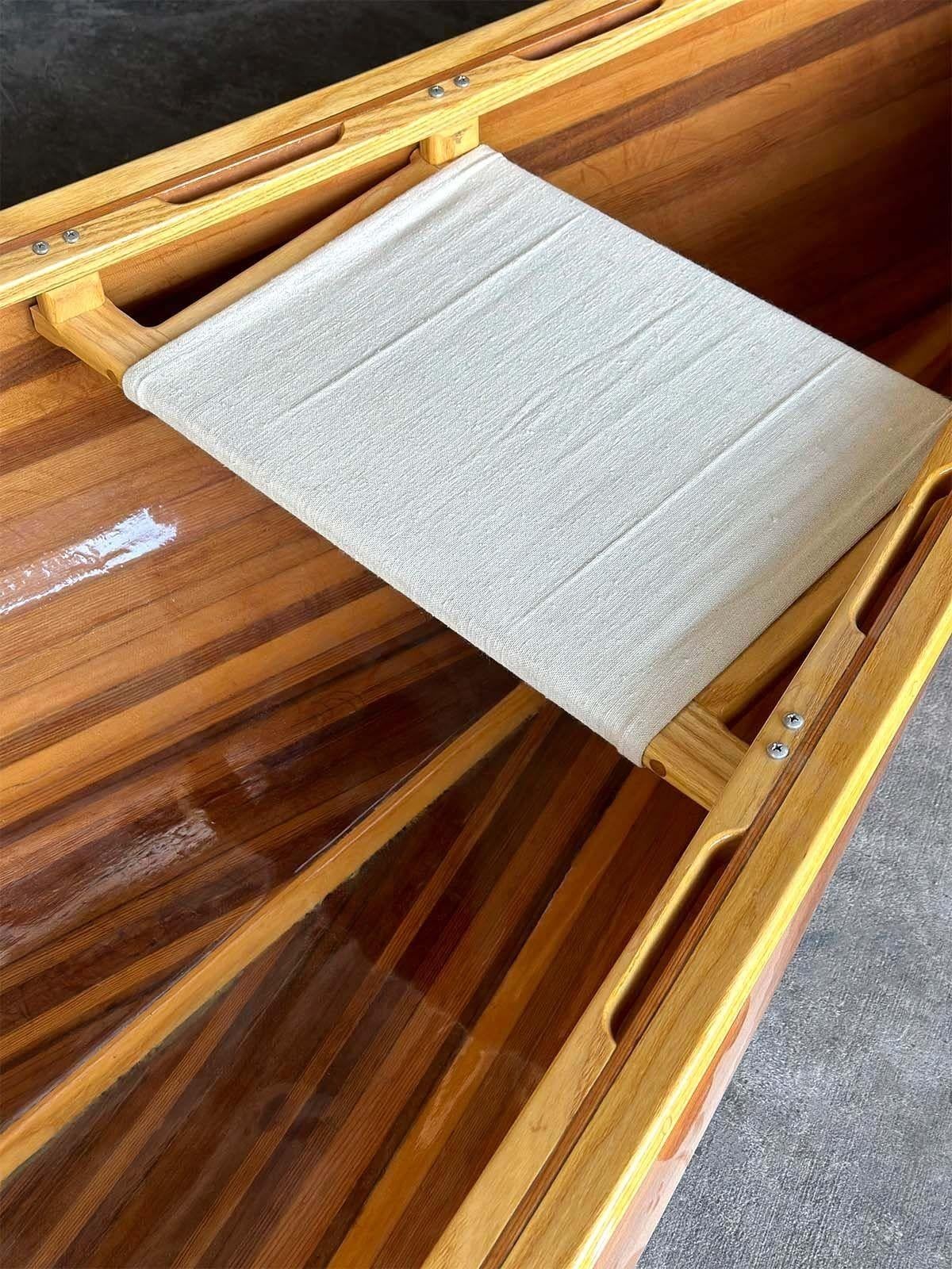 Vintage cedar strip wood canoe. Made in USA, circa 1970s.
Dimensions:
14