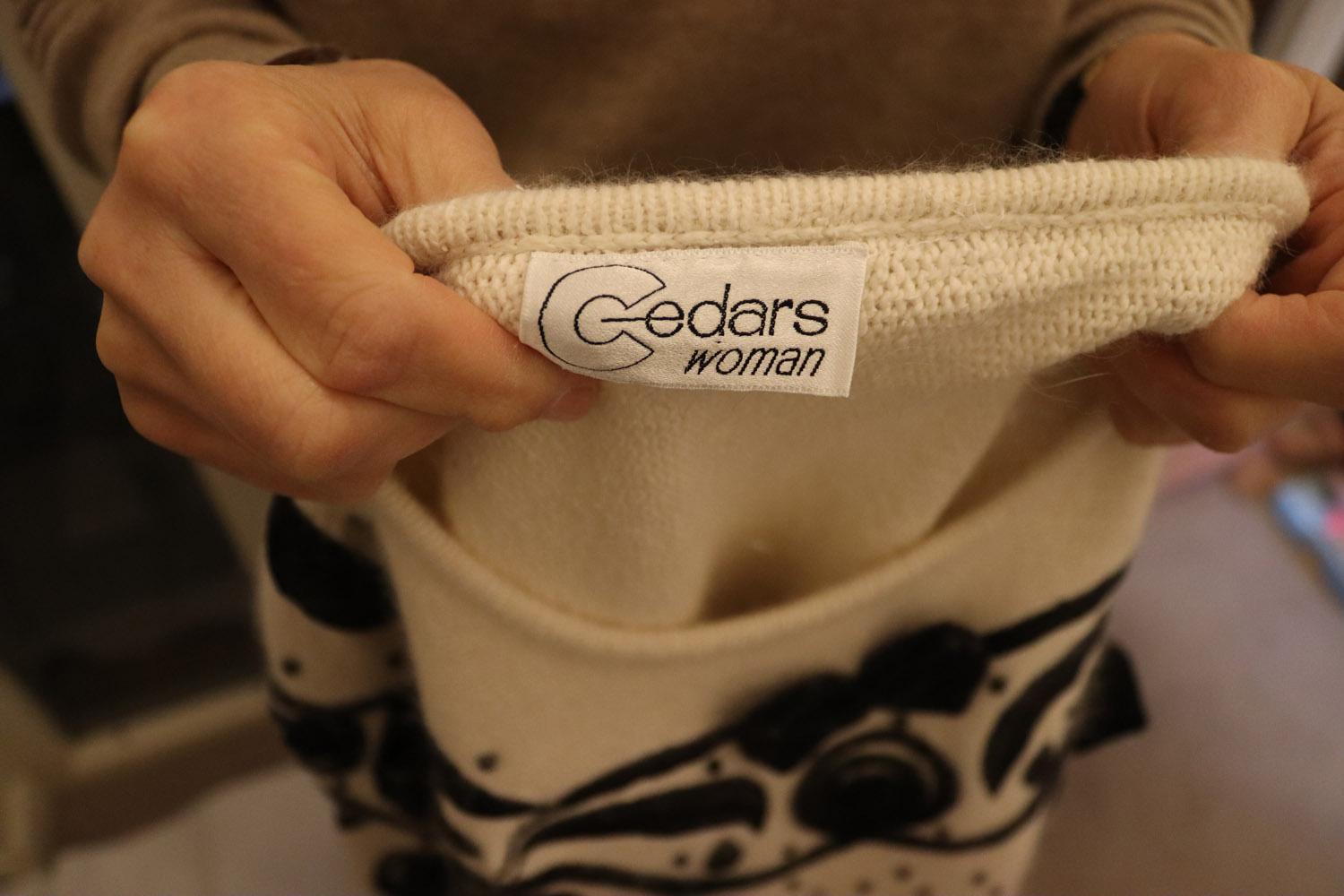 A wonderful warmer by Cedar. In a wool and silk mix , in a pretty ivory colour the jumper/ sweater has black velvet and leather detail on the front. 
Measurements : Bust up to 46'', length 38''