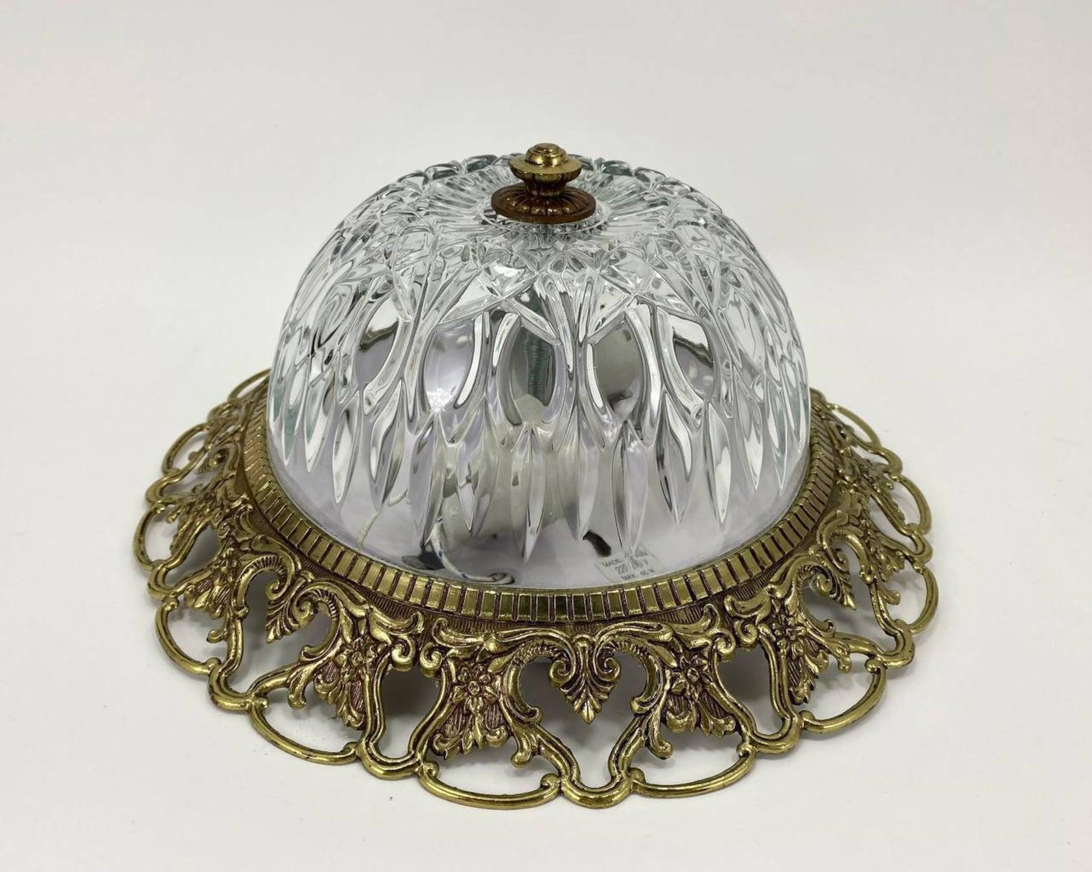 Amazing Wall or Ceiling Chandelier. 

 The lamp has a round gilt brass wall frame on which a patterned half sphere of crystal is placed, dimming the brightness of the light. 

 A wall-ceiling lamp, made in a classic style, is an excellent