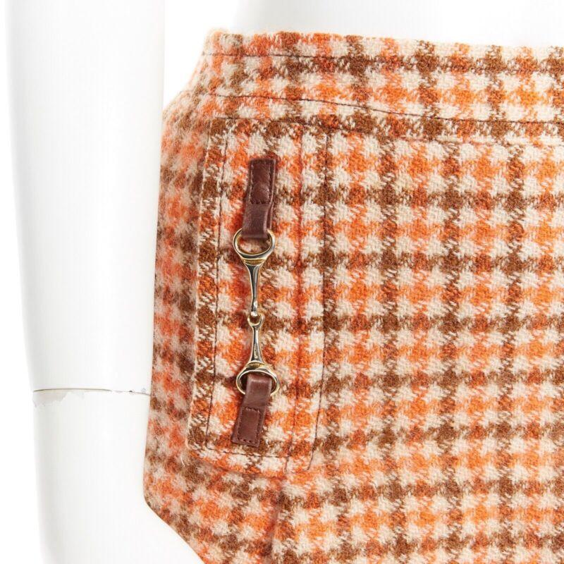 vintage CELINE 1980 orange check wool pleat skirt leather horsebit cuff FR44 XXL
Reference: TGAS/A03271
Brand: Celine
Designer: Phoebe Philo
Material: Wool
Color: Orange, Brown
Pattern: Checkered
Closure: Zip
Extra Details: Asymmetrical pleated
