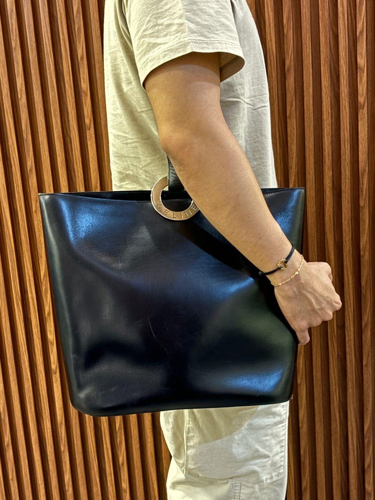 Vintage Celine Black Leather Circle Metal Logo Bucket Bag at 1stDibs