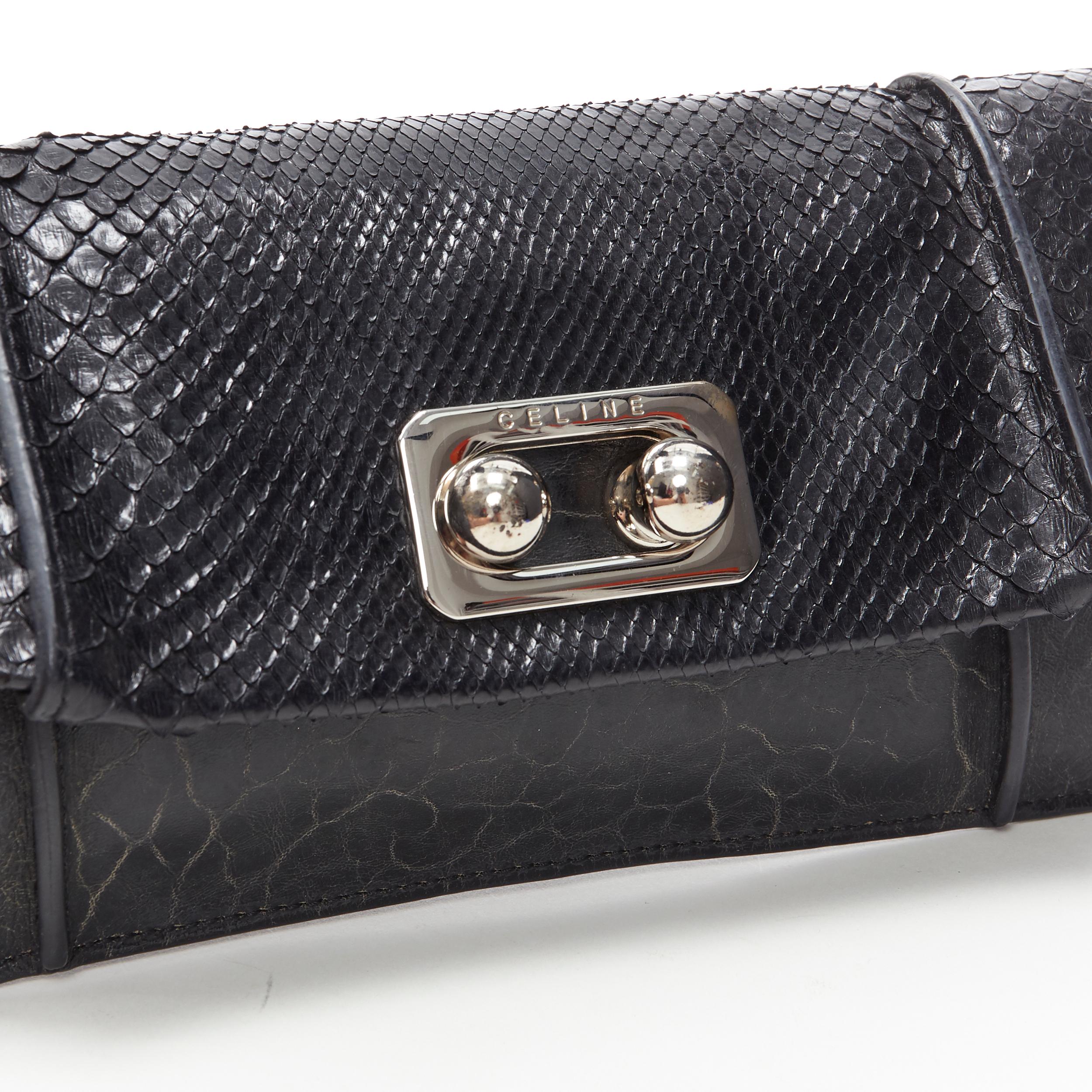 vintage CELINE black scaled leather flap silver ball buckle long clutch bag
Reference: MAWG/A00018
Brand: Celine
Designer: Phoebe Philo
Model: 
