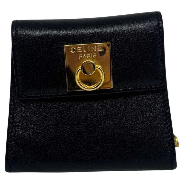 Celine vintage black mini sling purse in very good vintage condition. No significant scuffs or scratches.  Gold crossbody chain. Very cute piece to add to your collection. Comes with its dust bag.