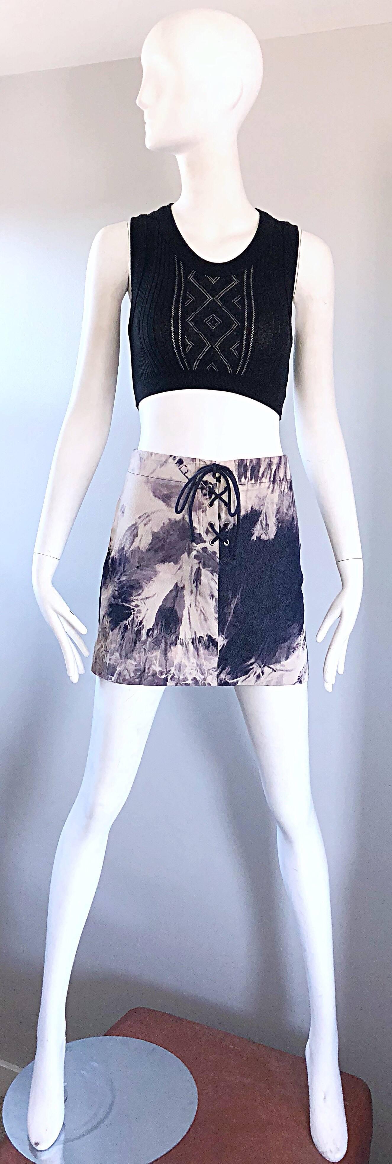 Sexy 1990s CELINE tie dye mini skirt. Navy blue indigo and white allover tie-dye print. Laces up the center front. Great with boots, heels, flats, sandals or wedges. The pictured vintage Jean Paul Gaultier black crop top is also available in my